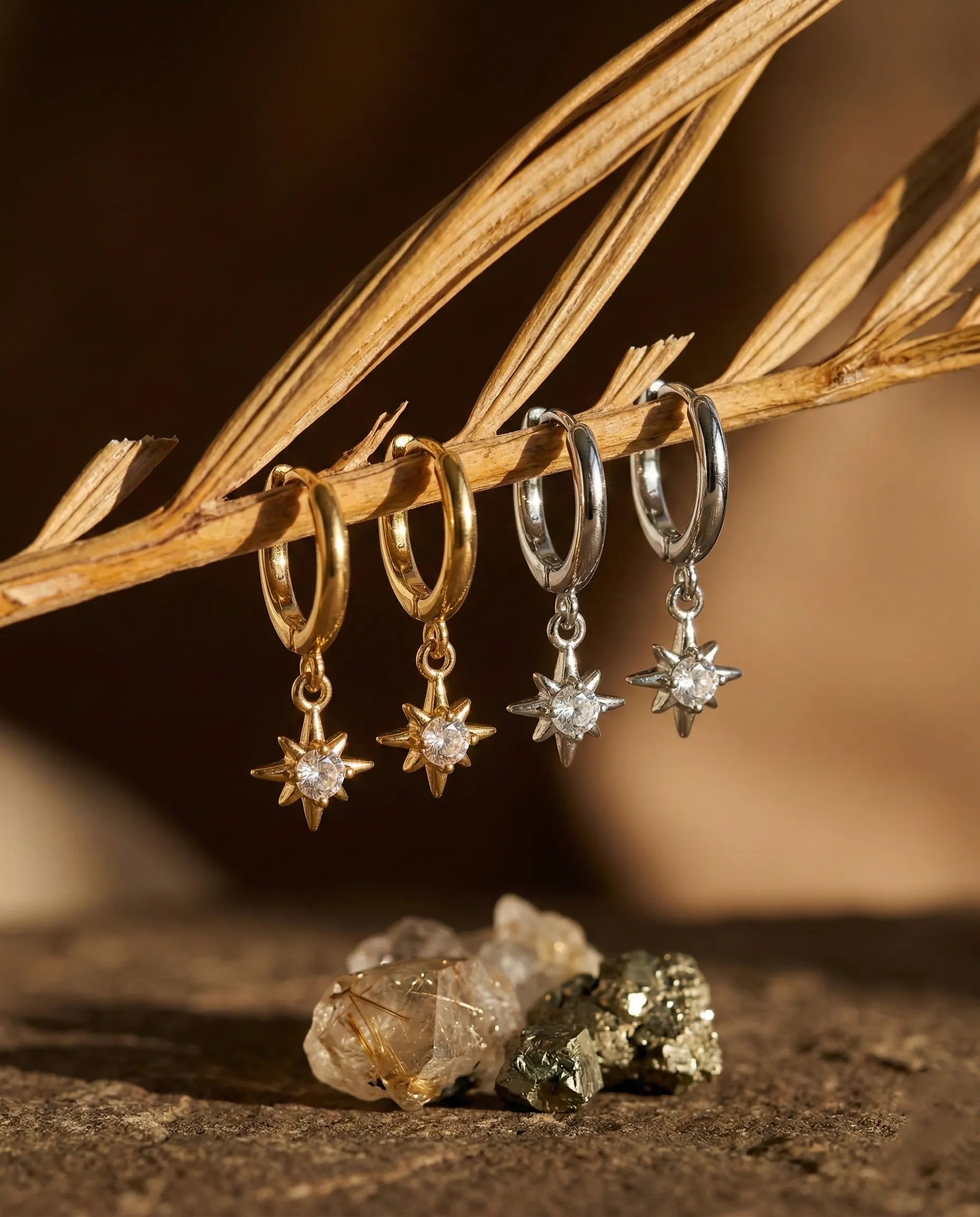 stardust-north-star-huggie-earrings-gold-silver-925-sterling, celestial-star-charm-hoops-luxury, luxury-minimalist-jewelry-aesthetic, 925-sterling-silver-earrings-europe, senya-jewelry-best-seller-stardust-collection