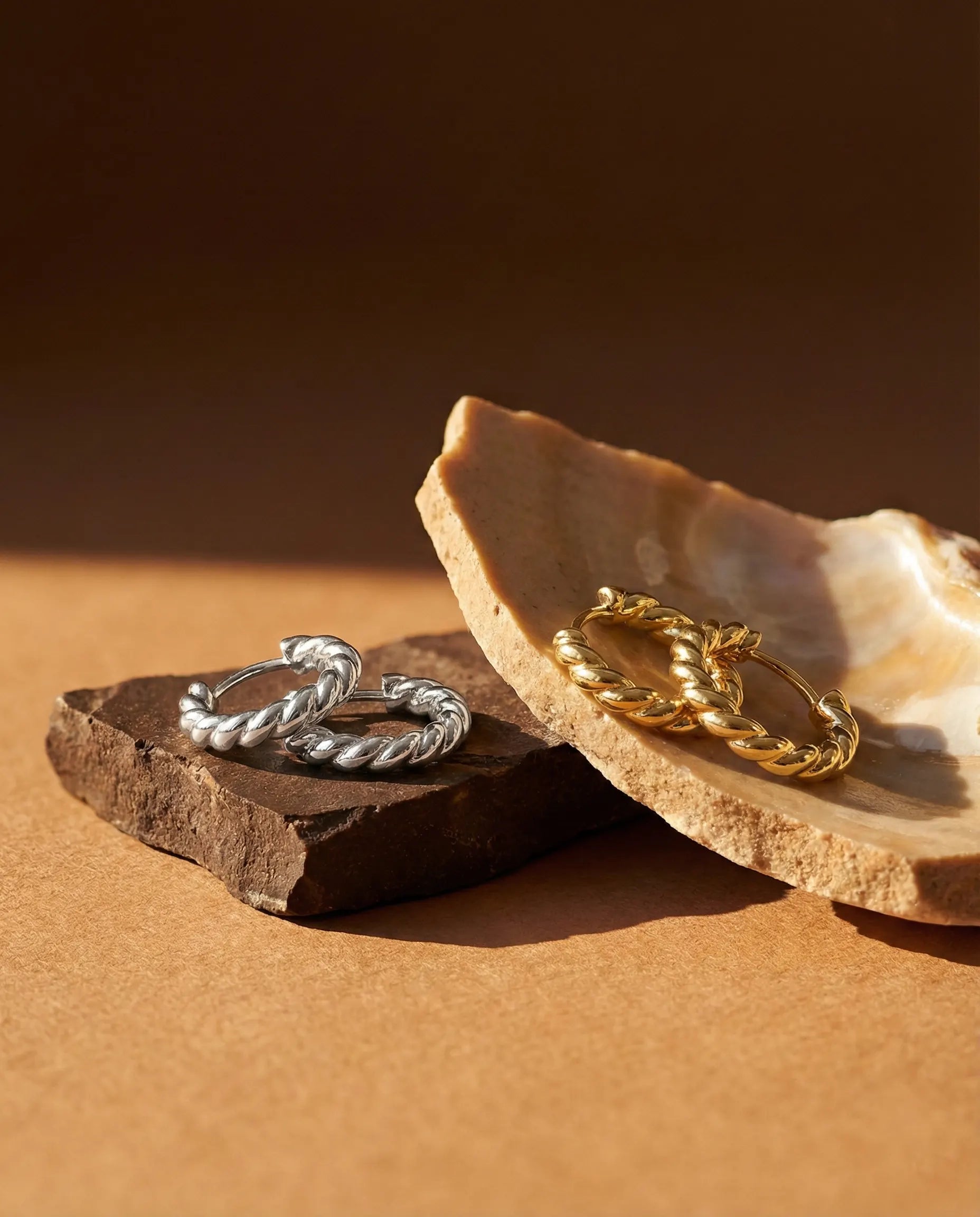 swirelle-twisted-huggie-hoop-earrings-gold-vermeil-silver, minimalist-twisted-rope-design, luxury-understated-jewelry-aesthetic, 925-sterling-silver-waterproof-jewelry-europe, senya-jewelry-best-seller-twisted-huggies