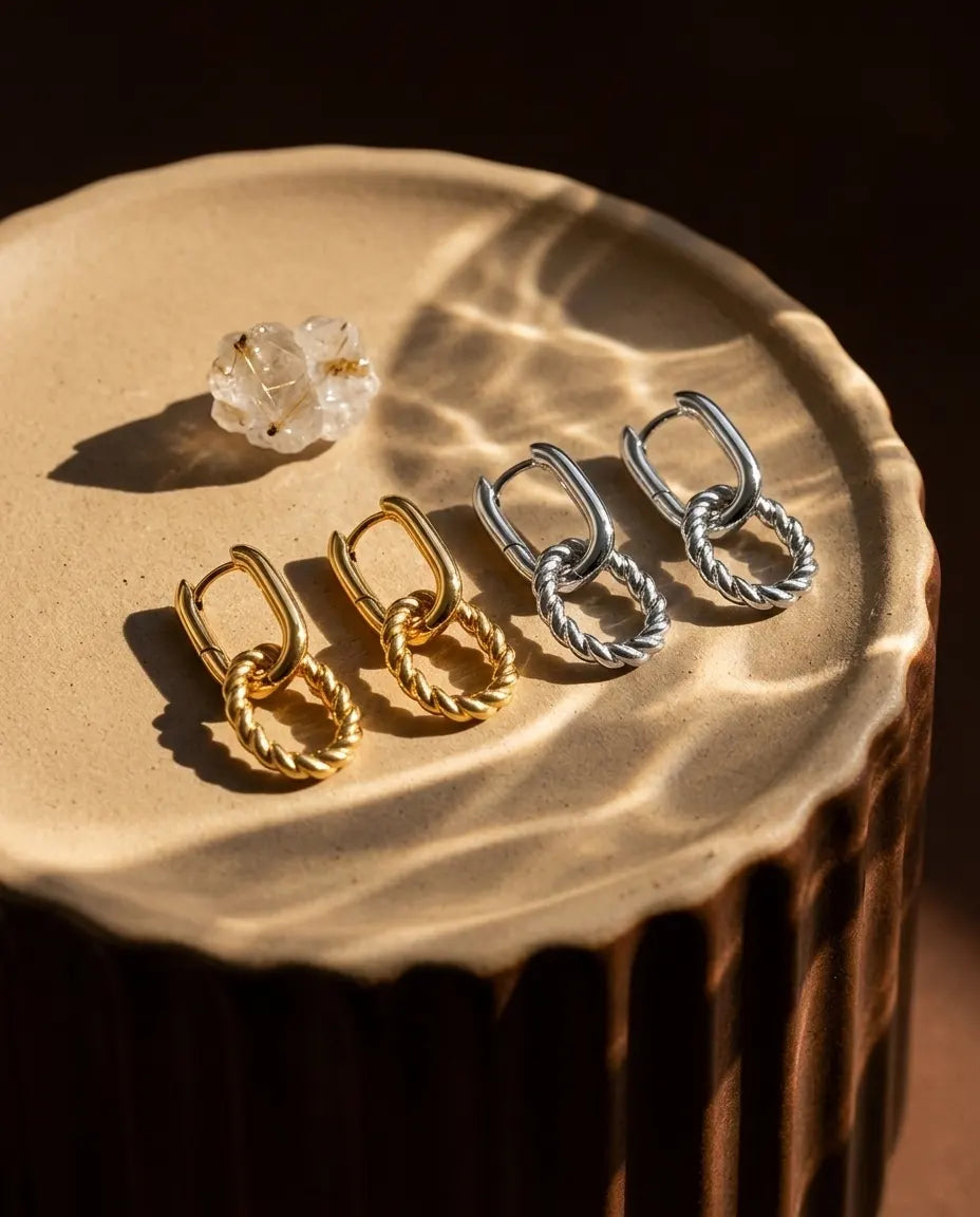 timeless-architectural-aesthetic-hoops-modern, 18k-gold-pvd-detail-ferrach-earrings, gift-ideas-for-women-minimalist-jewelry, luxury-boutique-jewelry-netherlands, artistic-jewelry-flatlay-photography