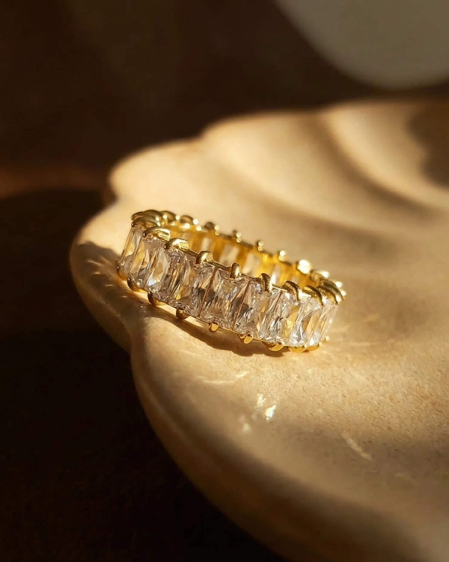 timeless-baguette-eternity-aesthetic-ring-modern, 18k-gold-pvd-plating-detail, gift-ideas-for-women-sparkling-ring, high-shine-baguette-jewelry-europe, luxury-boutique-jewelry-netherlands
