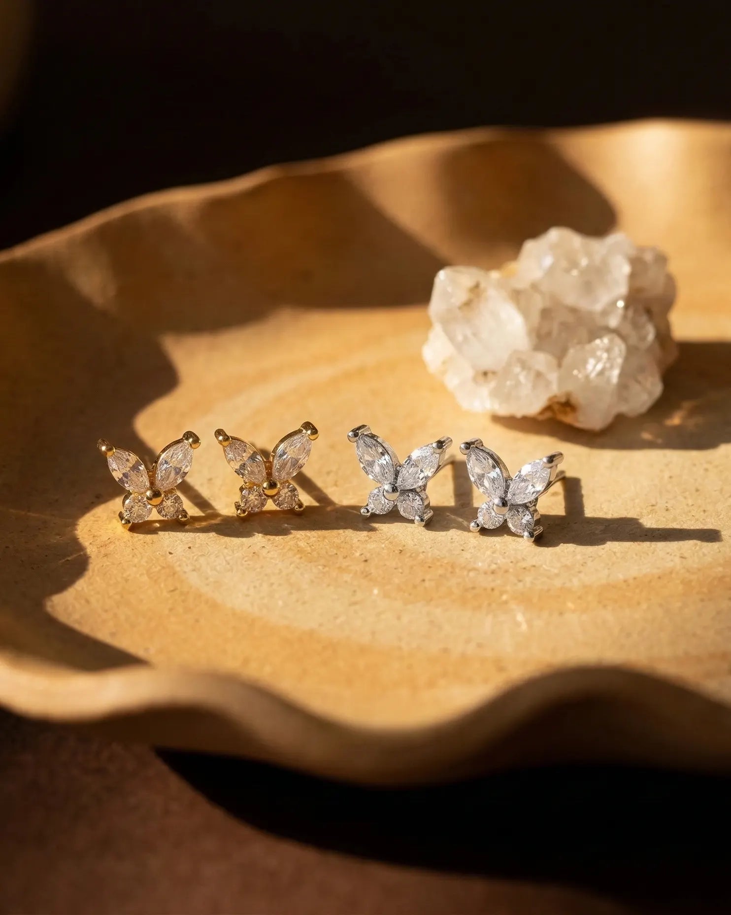 timeless-minimalist-aesthetic-butterfly-earrings-modern, 18k-gold-vermeil-finish-detail-butterfly-studs, gift-ideas-for-women-sparkling-animal-jewelry, luxury-boutique-jewelry-netherlands, artistic-jewelry-flatlay-photography