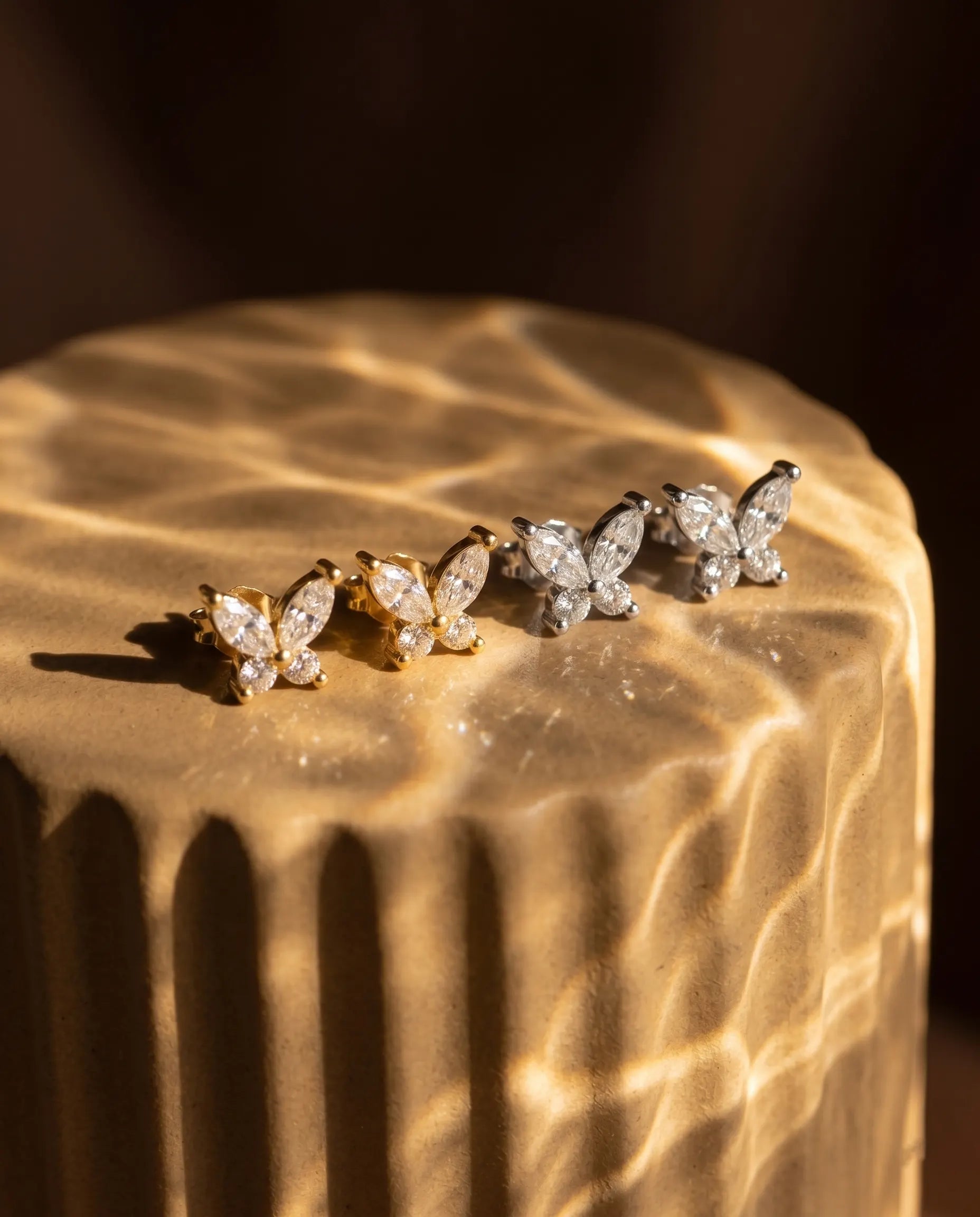 timeless-minimalist-aesthetic-butterfly-earrings-modern, 18k-gold-vermeil-finish-detail-butterfly-studs, gift-ideas-for-women-sparkling-animal-jewelry, luxury-boutique-jewelry-netherlands, artistic-jewelry-flatlay-photography