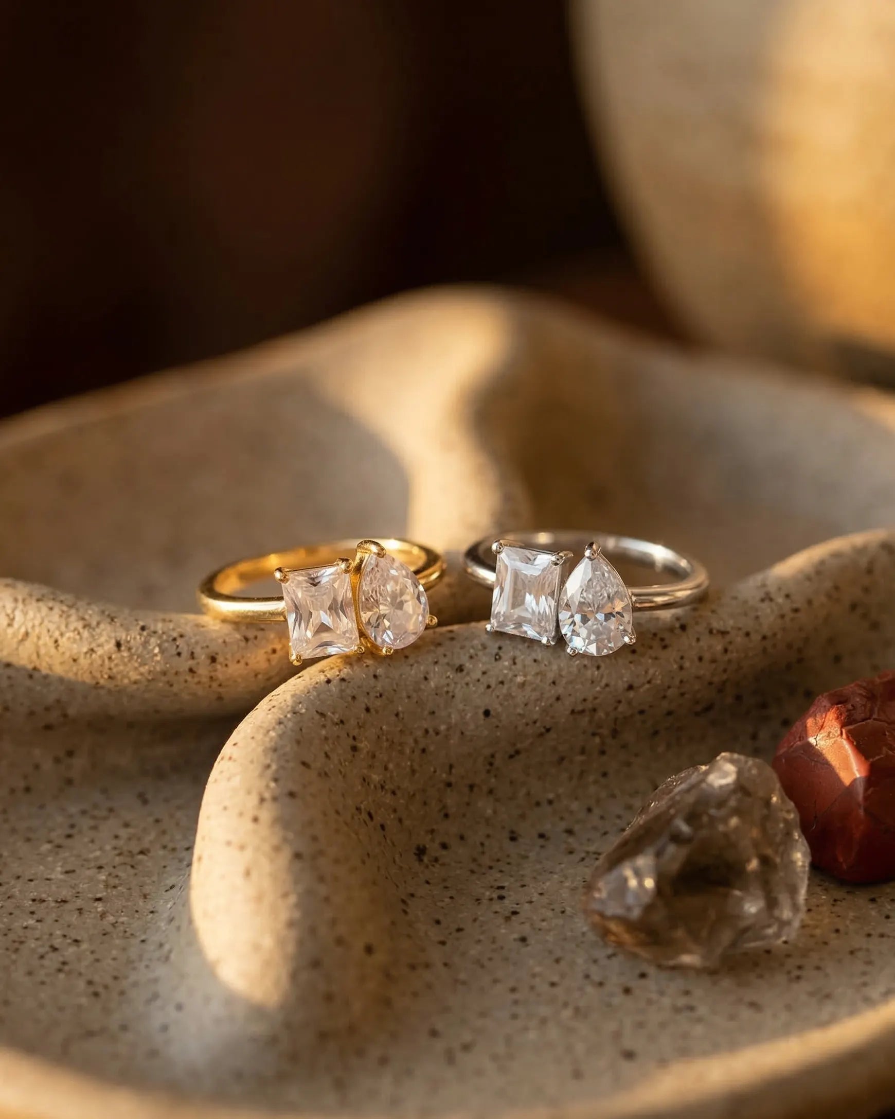 timeless-modern-aesthetic-emerald-pear-cut-band-gold-silver, 18k-gold-vermeil-finish-detail-sunday-ring, gift-ideas-for-women-elegant-double-stone-jewelry, luxury-boutique-jewelry-netherlands, artistic-jewelry-flatlay-photography