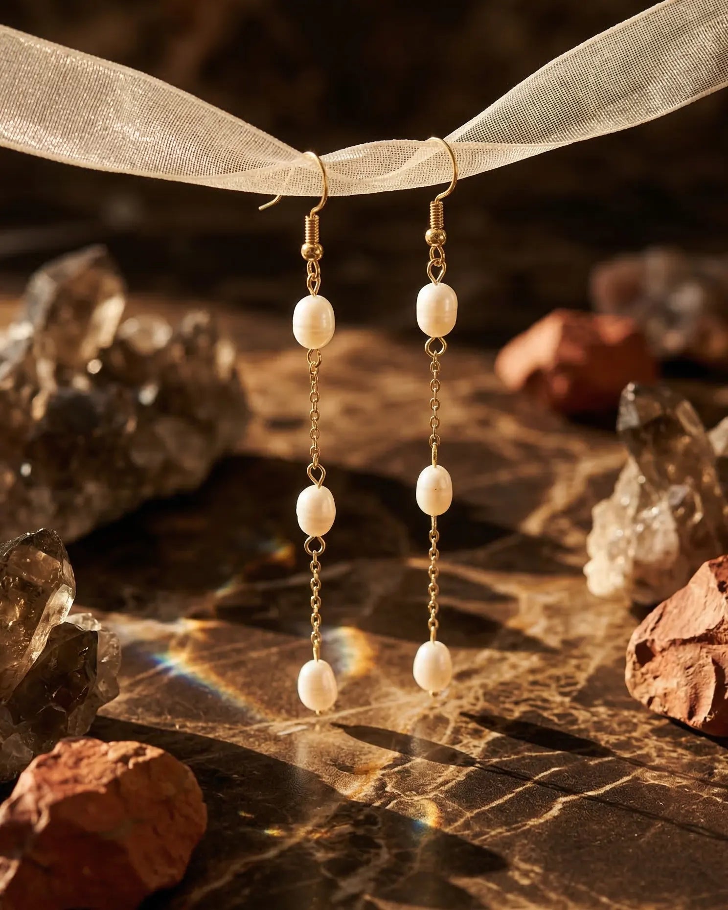 timeless-modern-aesthetic-long-pearl-earrings-silver, 925-sterling-silver-finish-detail-miriam-drops, gift-ideas-for-women-elegant-pearl-jewelry, luxury-boutique-jewelry-netherlands, artistic-jewelry-flatlay-photography