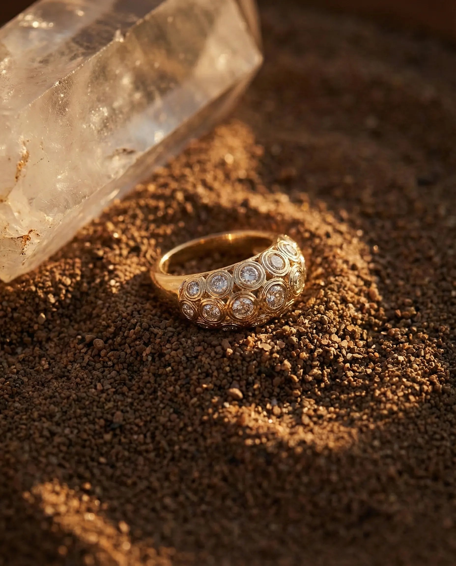 timeless-modern-aesthetic-oval-halo-ring-modern, 18k-gold-pvd-finish-detail-calytrix-ring, gift-ideas-for-women-sparkling-jewelry, luxury-boutique-jewelry-netherlands, artistic-jewelry-flatlay-photography