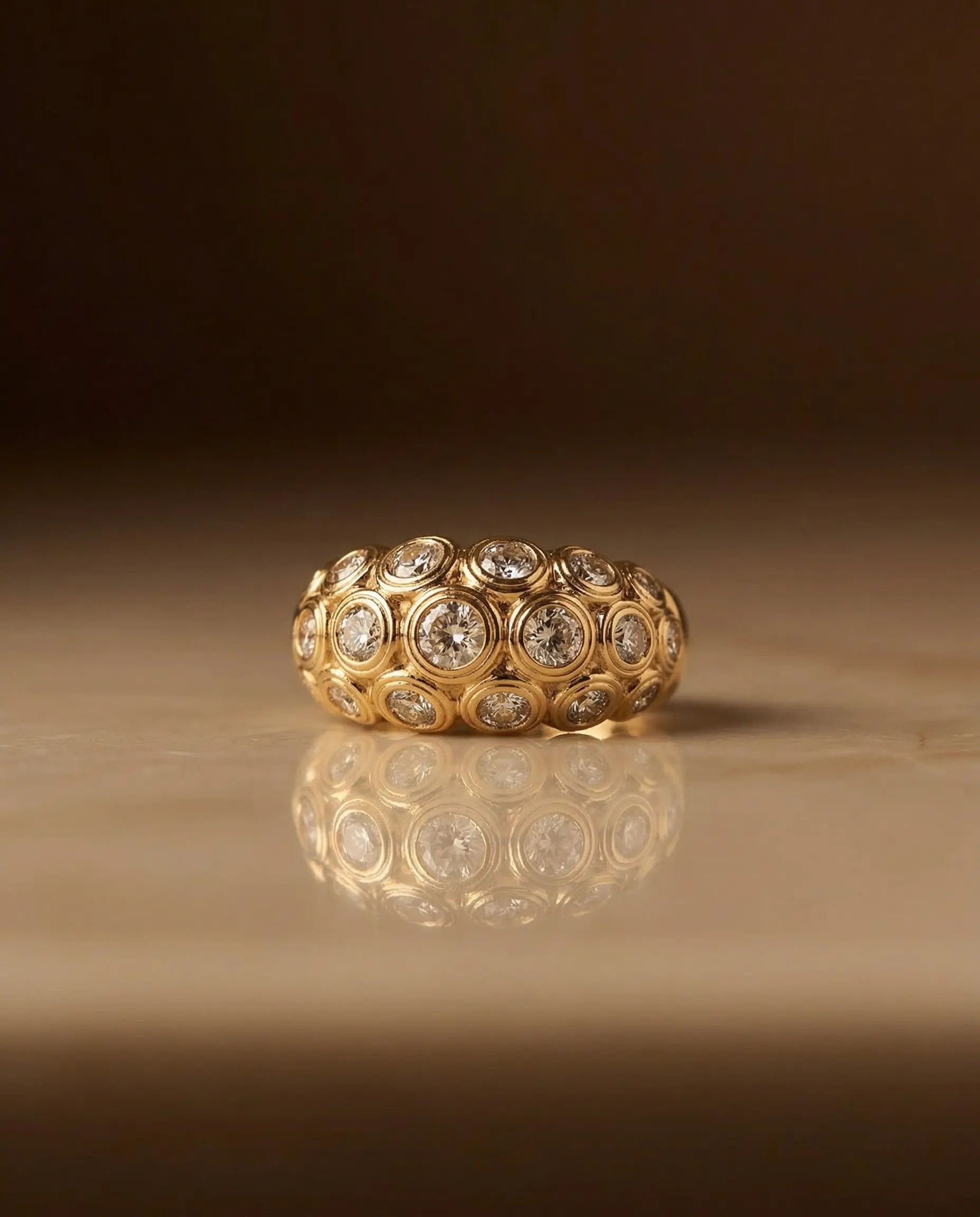 timeless-modern-aesthetic-oval-halo-ring-modern, 18k-gold-pvd-finish-detail-calytrix-ring, gift-ideas-for-women-sparkling-jewelry, luxury-boutique-jewelry-netherlands, artistic-jewelry-flatlay-photography