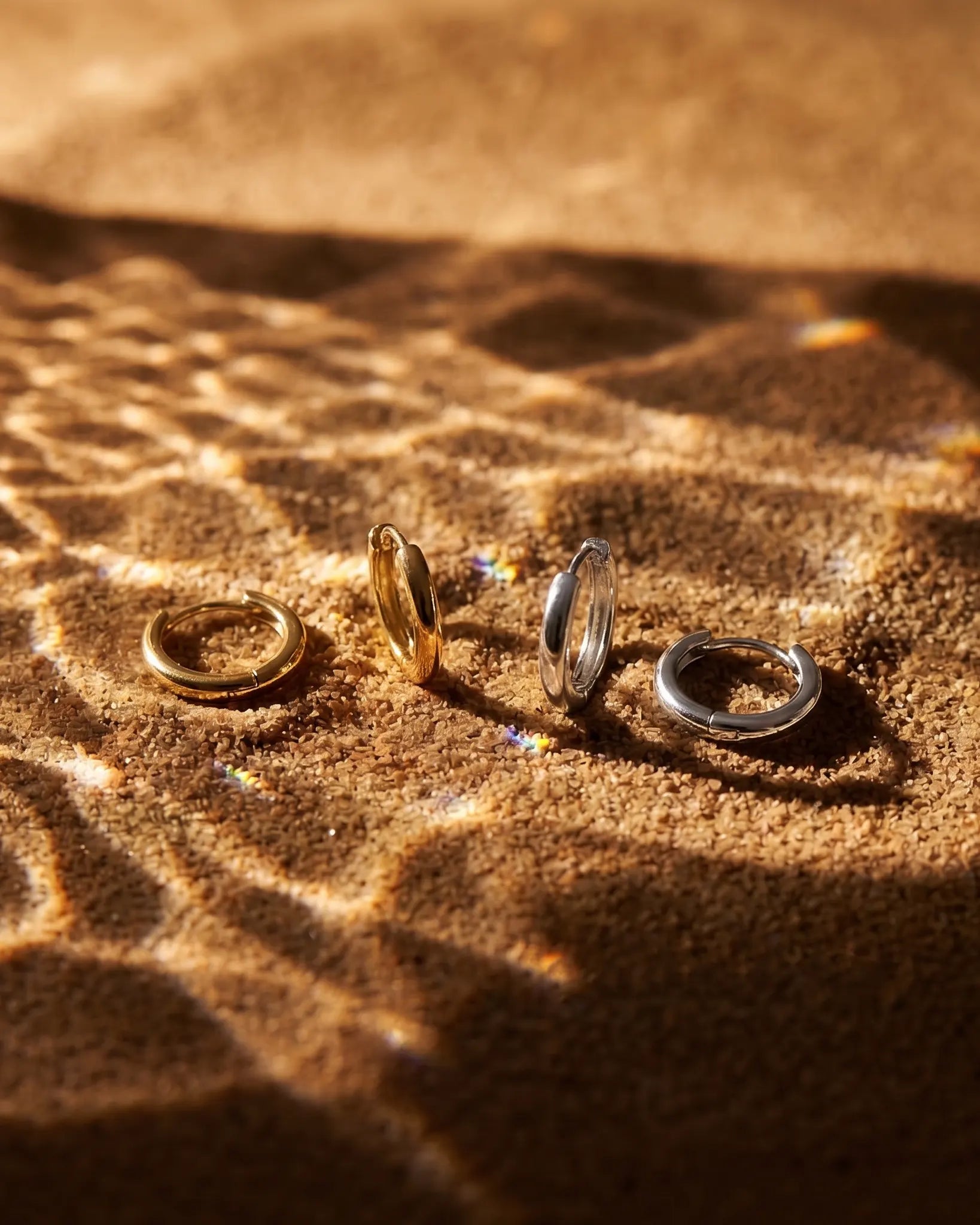 timeless-modern-aesthetic-solitaire-drop-earrings-gold, 18k-gold-vermeil-finish-detail-wendy-huggies, gift-ideas-for-women-shimmering-silver-jewelry, luxury-boutique-jewelry-netherlands, artistic-jewelry-flatlay-photography