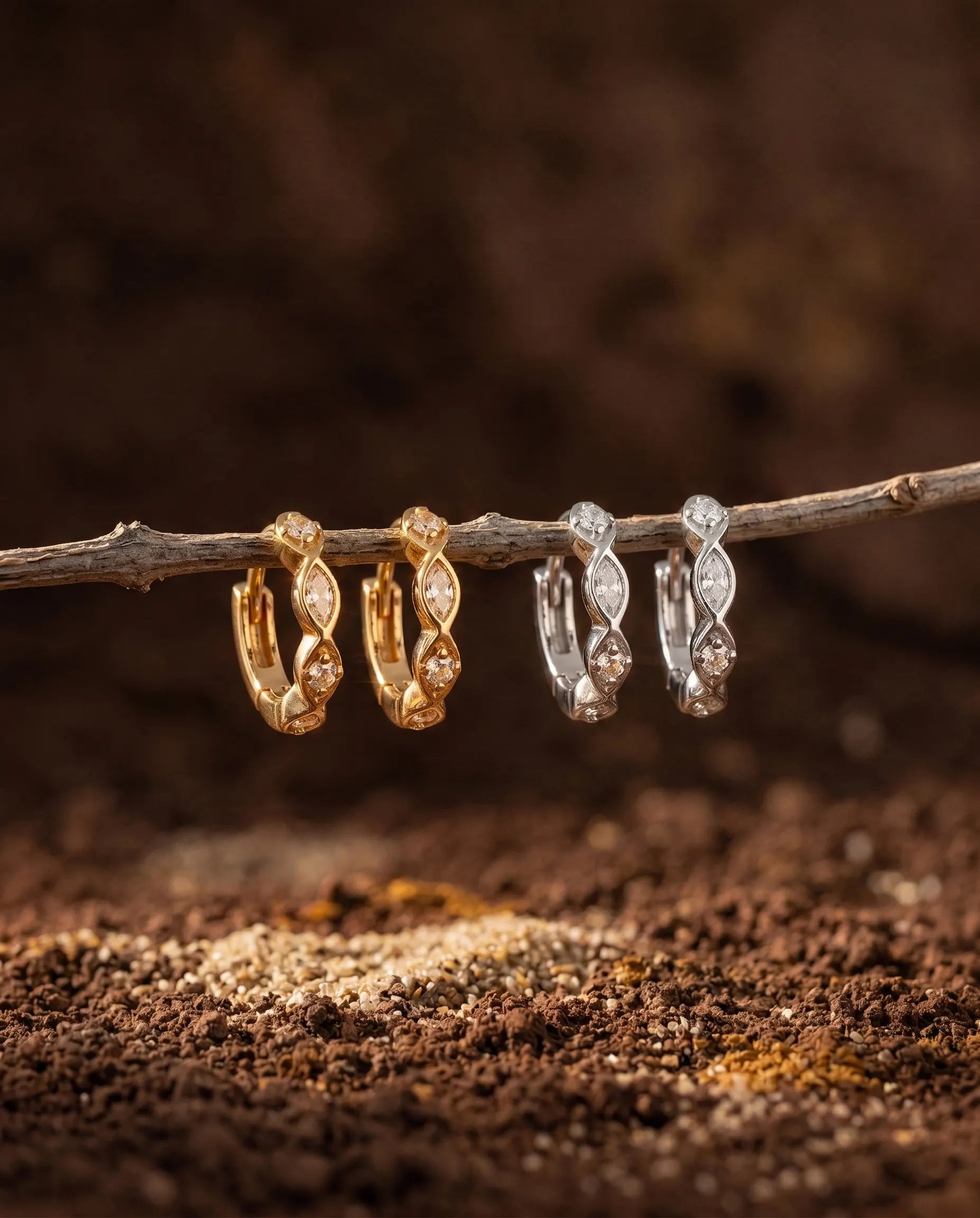 timeless-sparkle-earrings-nature-aesthetic, 18k-gold-vermeil-huggies-detail, gift-ideas-for-women-sparkling-jewelry, high-clarity-zirconia-hoops-europe, luxury-boutique-jewelry-netherlands, artistic-jewelry-flatlay-photography