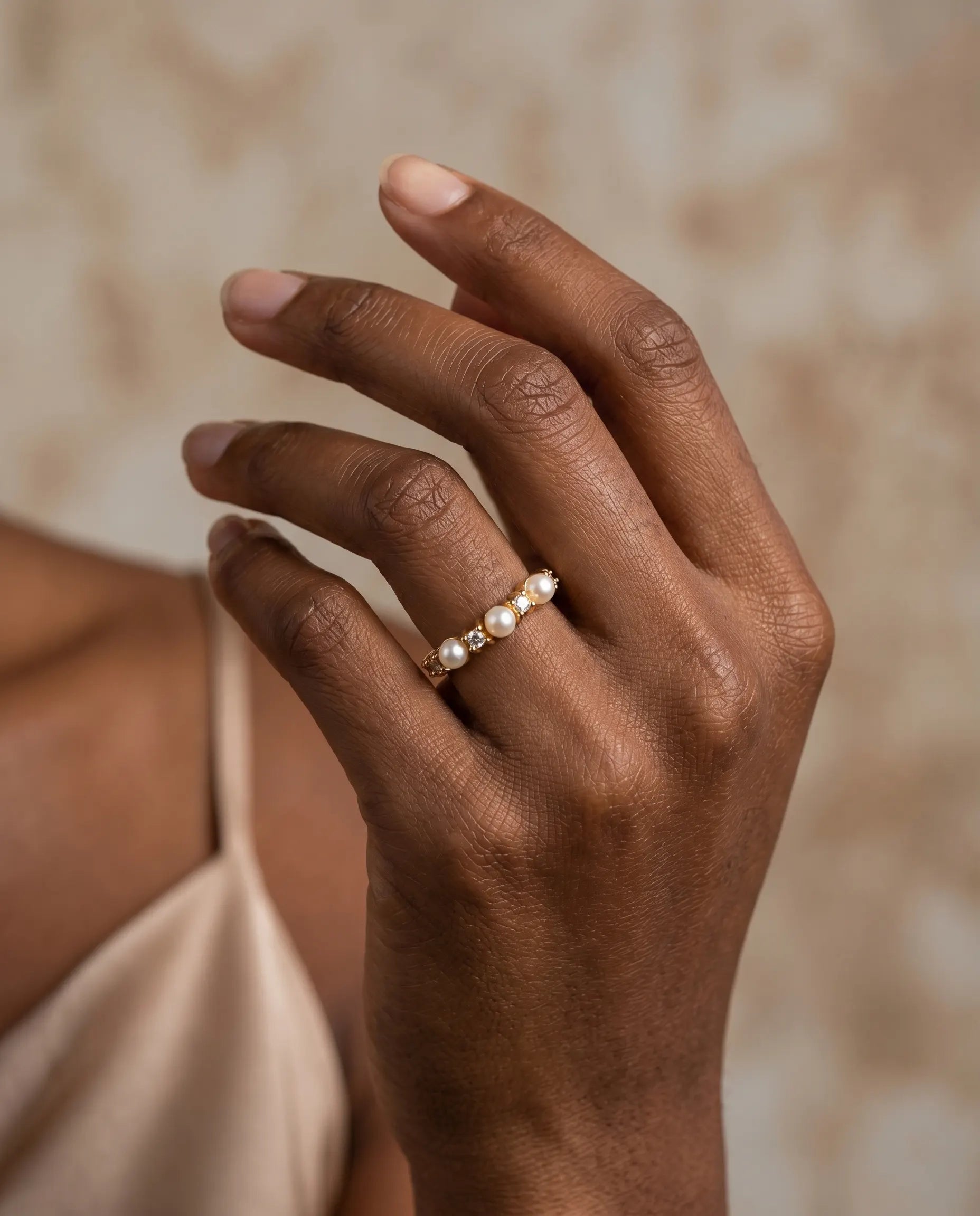 versatile-daily-wear-gold-barletta-statement-ring, effortless-high-end-pearl-jewelry-style, minimalist-accessories-for-refined-look, classy-stainless-steel-pearl-ring-lifestyle, senya-jewelry-barletta-collection