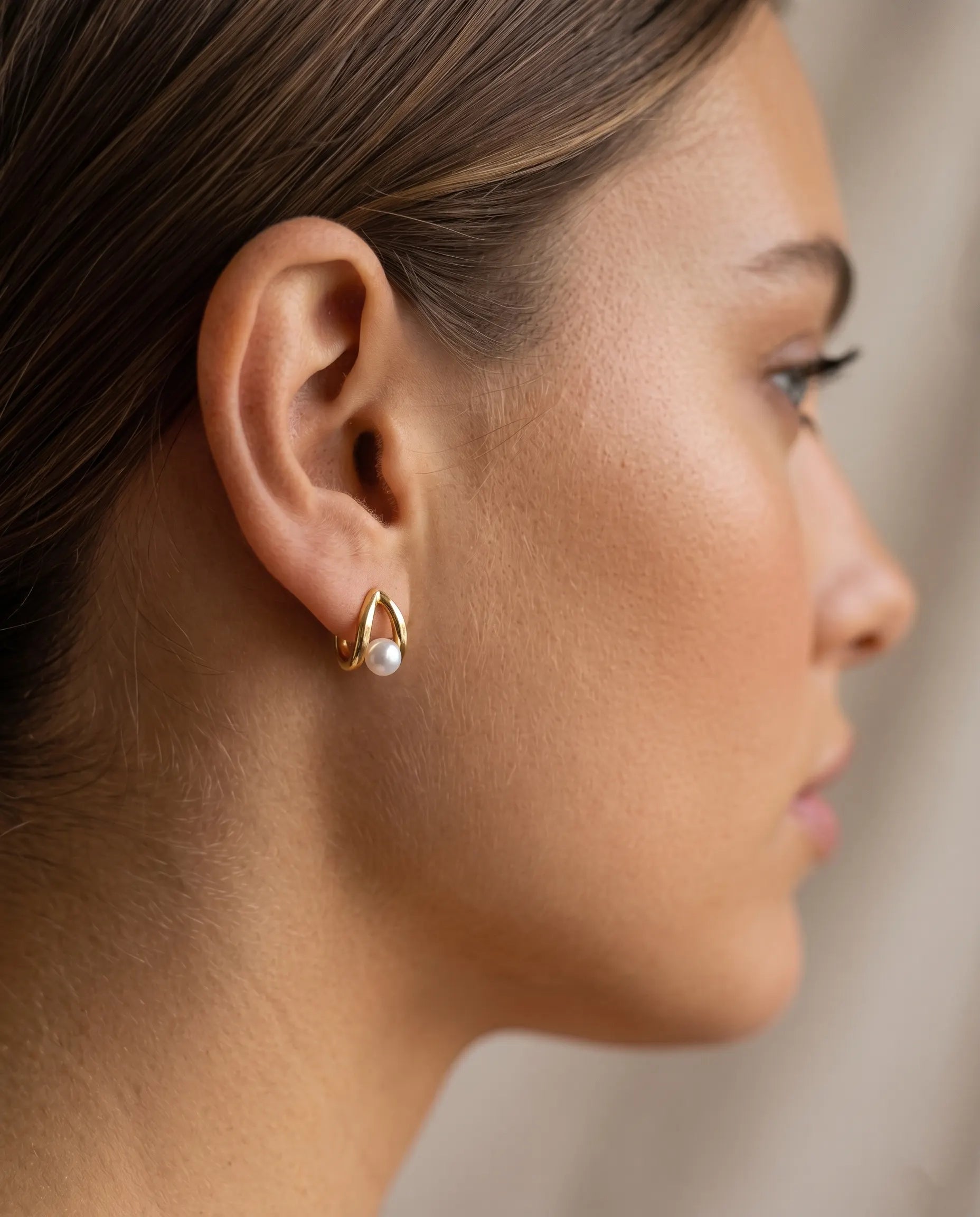 versatile-daily-wear-gold-lace-statement-earrings, effortless-high-end-pearl-triangle-style, minimalist-accessories-for-refined-look, classy-925-silver-pearl-earrings-lifestyle, senya-jewelry-lace-collection