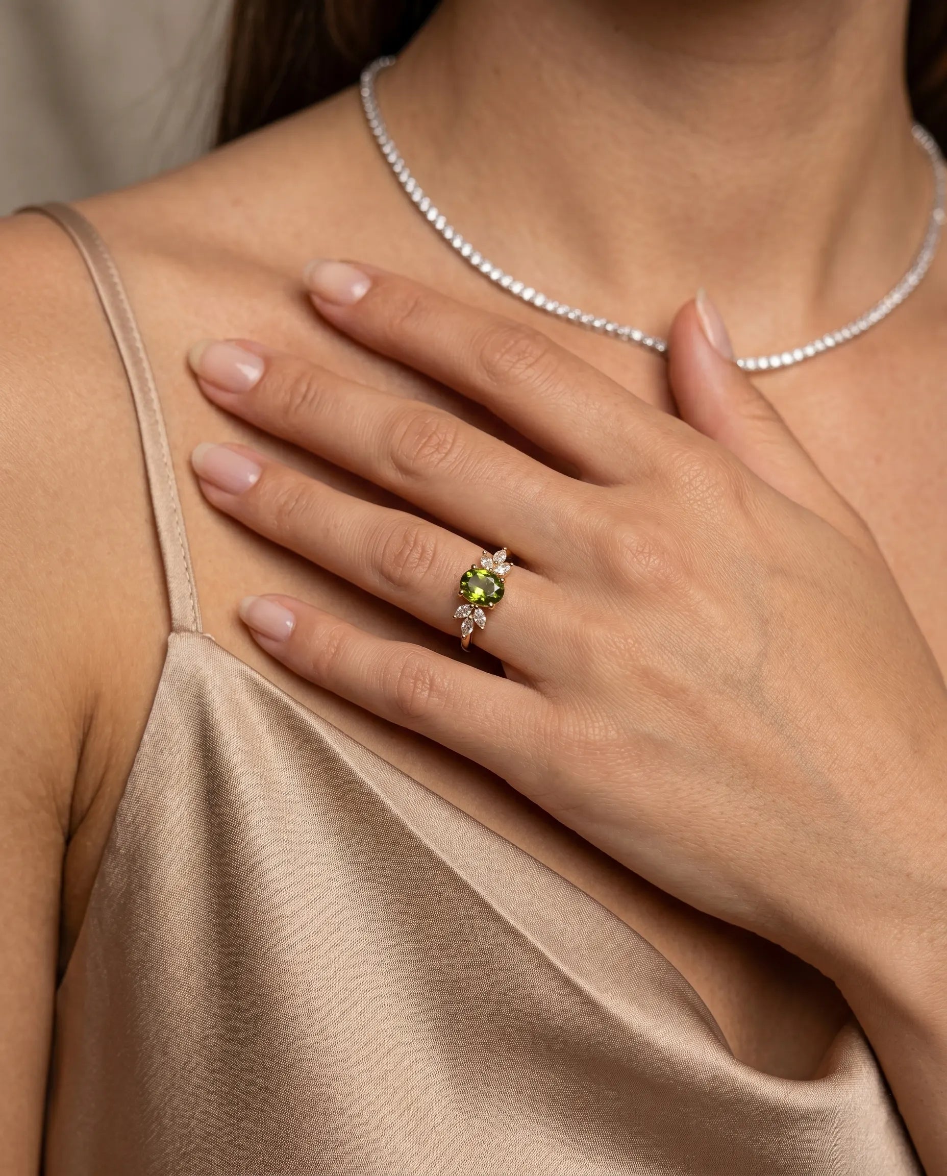versatile-daily-wear-green-statement-ring, effortless-elegance-jewelry-style, minimalist-accessories-for-cocktail-wear, classy-gold-plated-ring-lifestyle, high-shine-925-silver-green-ring, senya-jewelry-leona-collection