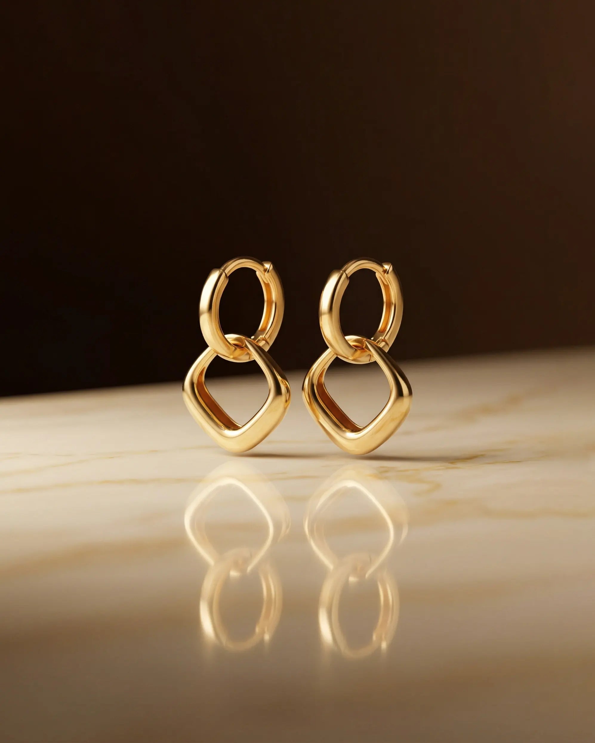 versatile-daily-wear-rhombus-drop-earrings, effortless-elegance-jewelry-style, minimalist-accessories-for-office-wear, classy-gold-925-silver-earrings-lifestyle, high-shine-geometric-jewelry
