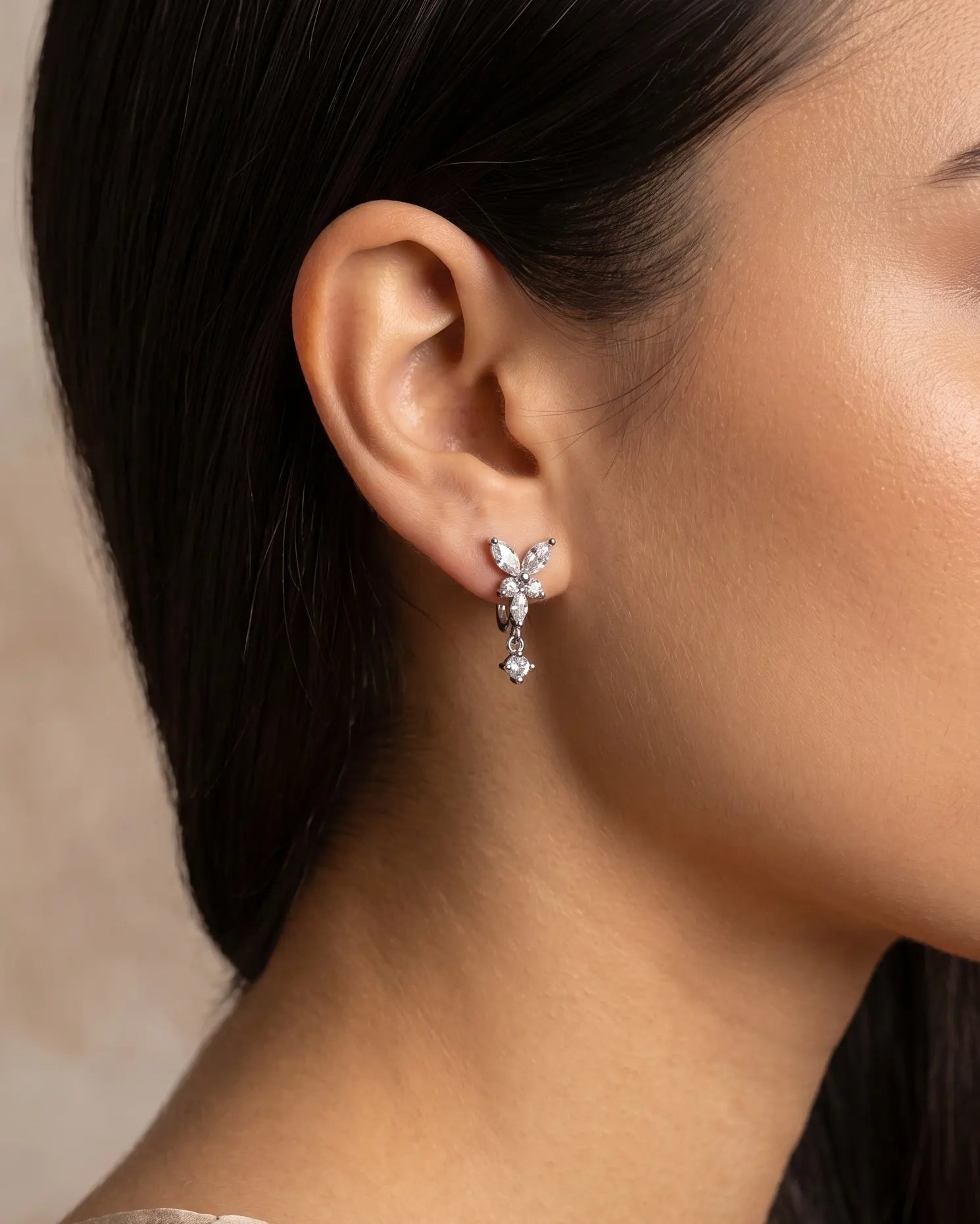 versatile-daily-wear-silver-butterfly-drop-earrings, effortless-elegance-jewelry-style, minimalist-accessories-for-special-occasions, classy-925-silver-sparkling-earrings, high-shine-chiara-collection-earrings