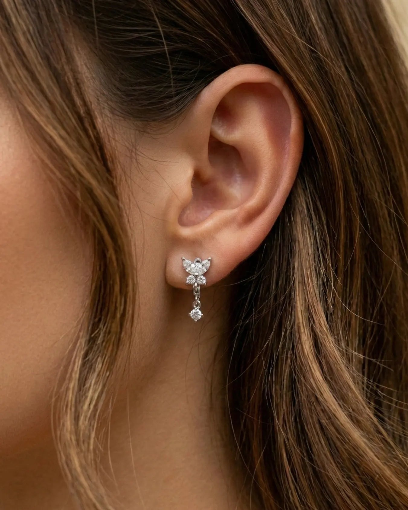 versatile-daily-wear-silver-butterfly-drop-earrings, effortless-elegance-jewelry-style, minimalist-accessories-for-special-occasions, classy-925-silver-sparkling-earrings, high-shine-chiara-collection-earrings