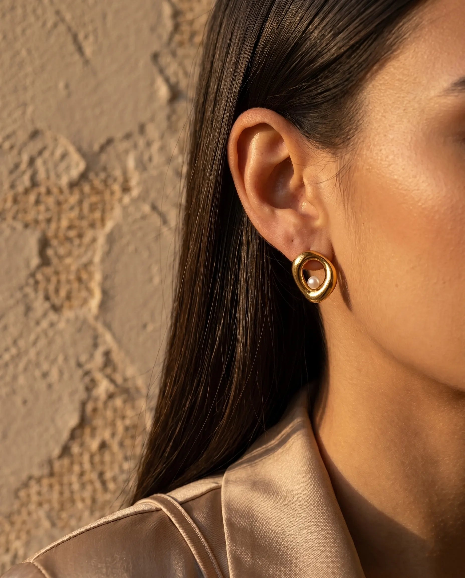 versatile-daily-wear-silver-cybelle-statement-earrings, effortless-high-end-liquid-silver-style, minimalist-accessories-for-refined-look, classy-stainless-steel-teardrop-earrings-lifestyle, senya-jewelry-cybelle-collection