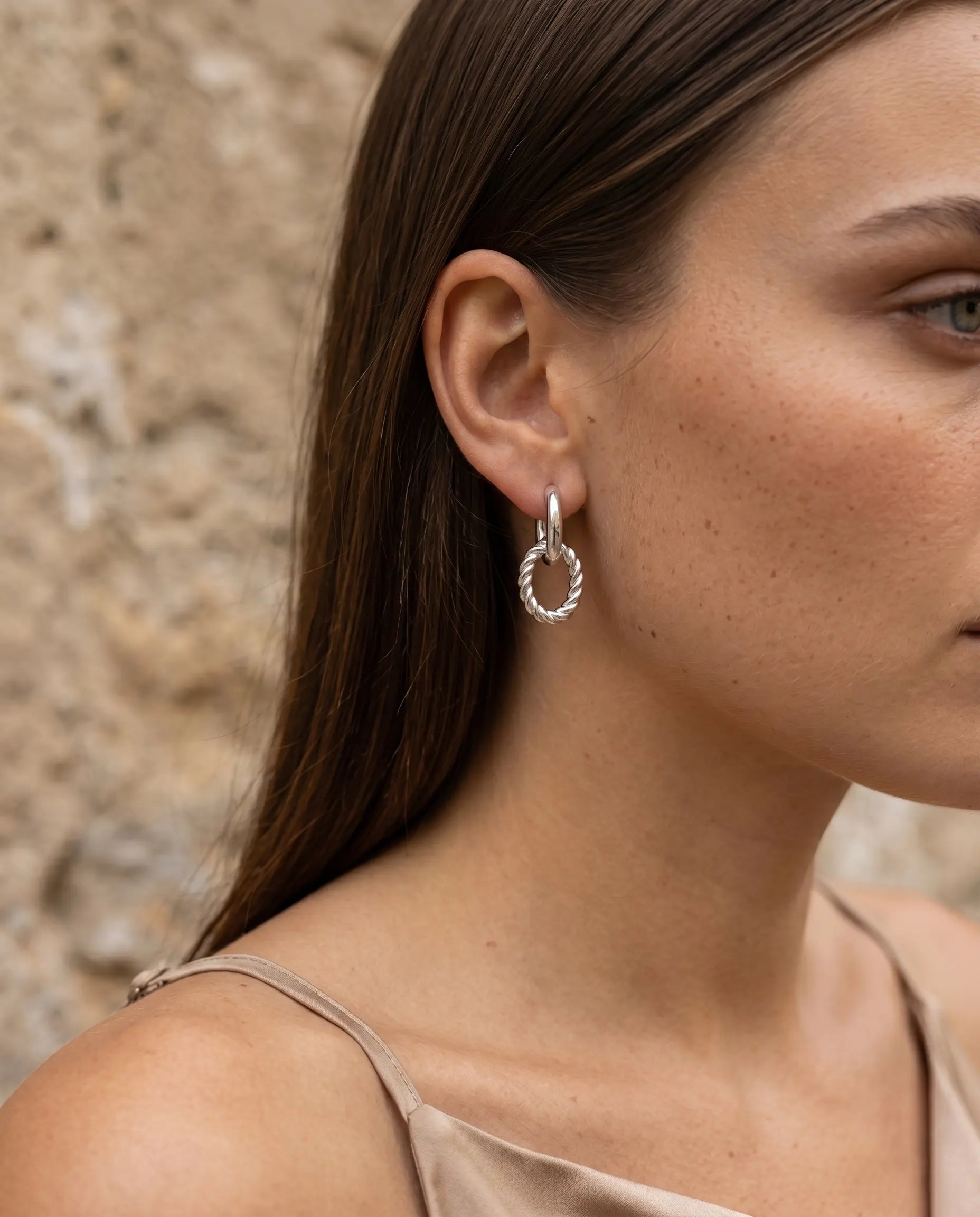 versatile-daily-wear-twisted-link-hoops, effortless-statement-jewelry-style, minimalist-accessories-for-blazer-and-heels, classy-gold-pvd-earrings-lifestyle, senya-jewelry-ferrach-collection