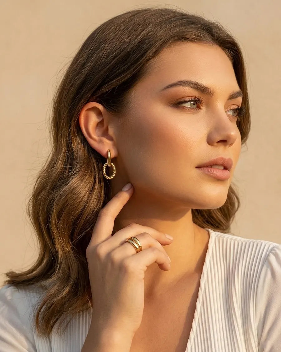 versatile-daily-wear-twisted-link-hoops, effortless-statement-jewelry-style, minimalist-accessories-for-blazer-and-heels, classy-gold-pvd-earrings-lifestyle, senya-jewelry-ferrach-collection