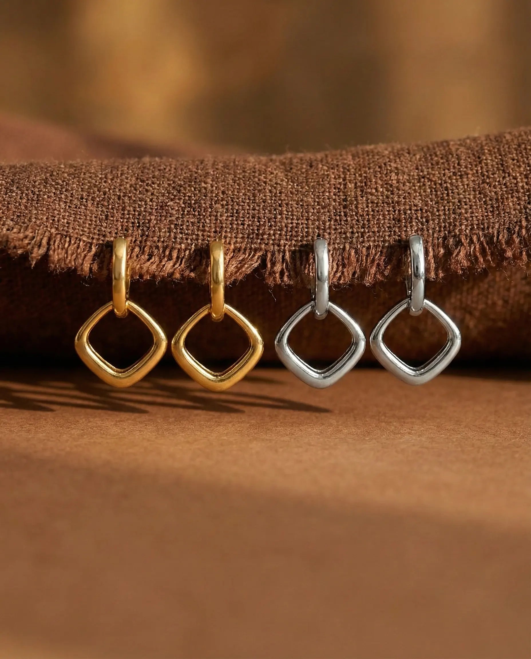 timeless-geometric-drop-earrings-modern-aesthetic, 18k-gold-plated-detail-eliza-earrings, gift-ideas-for-women-sculptural-jewelry, luxury-boutique-jewelry-netherlands, artistic-jewelry-flatlay-photography