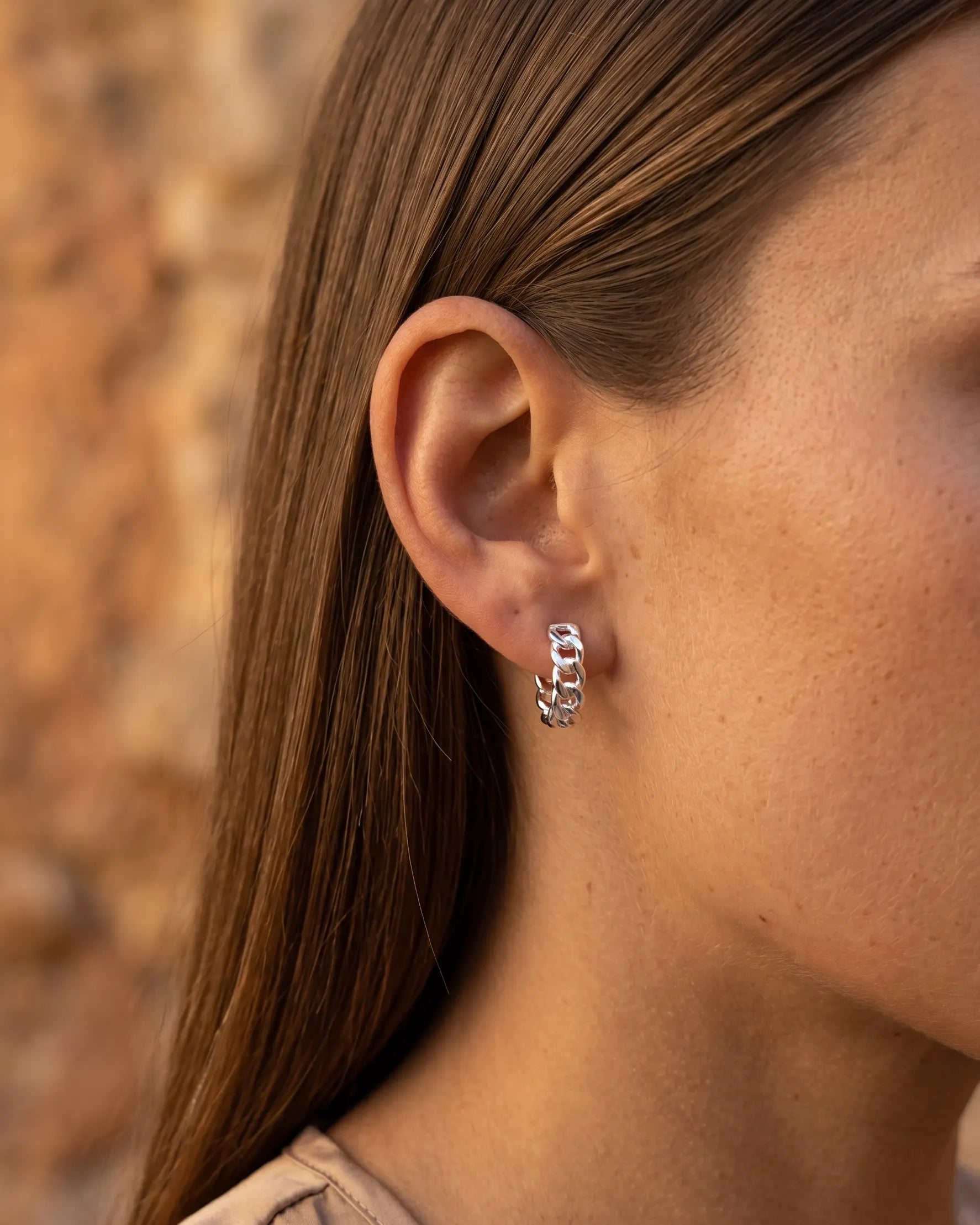 model-wearing-gold-hoop-earrings, classy-earrings-for-professional-women, elegant-daily-wear-jewelry, luxury-lifestyle-jewelry-photography, french-girl-aesthetic-earrings, minimalist-jewelry-style-guide, small-business-luxury-jewelry-brand, premium-hoops-for-women