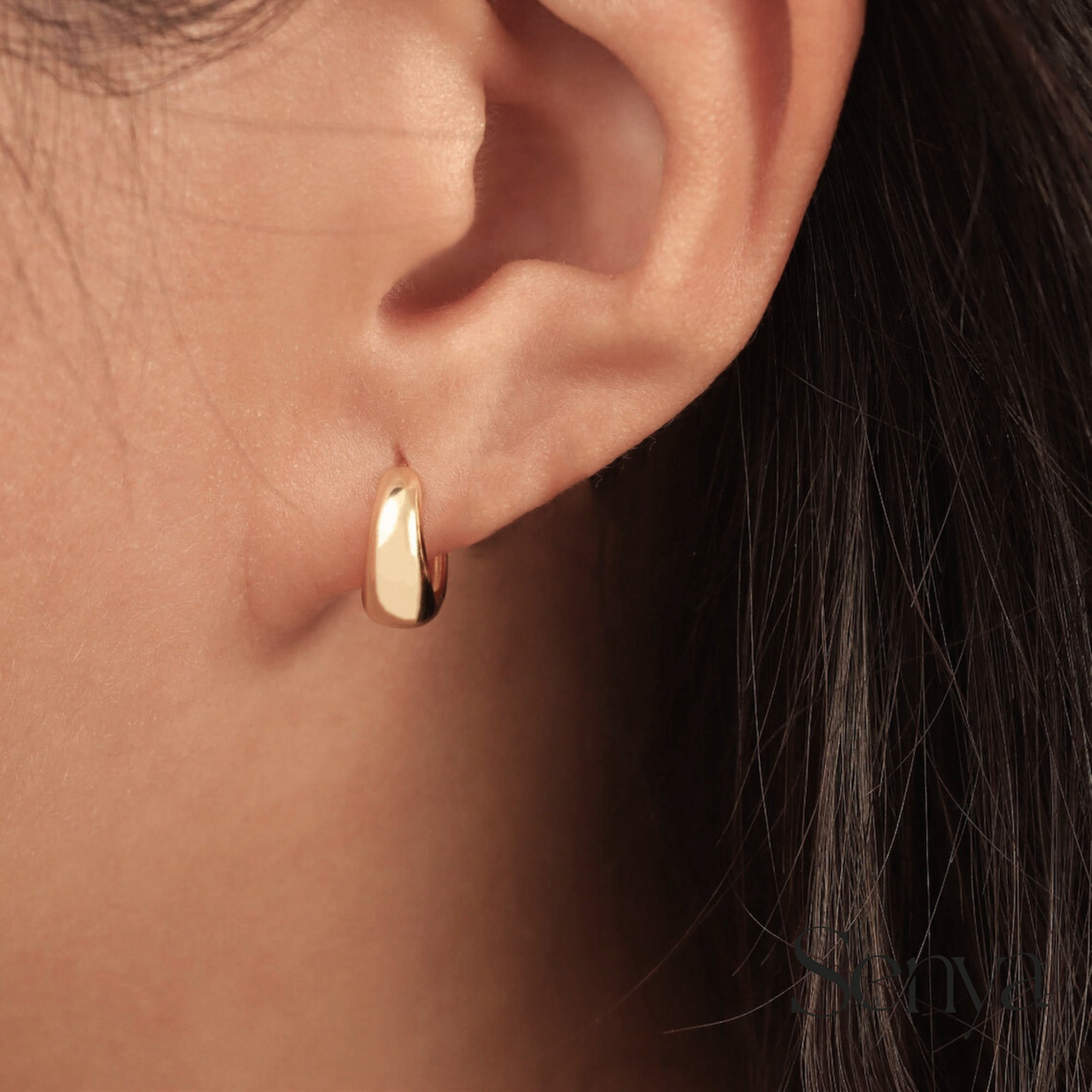 can I sleep in huggie earrings, do huggie earrings stay in, unique gold hoop earring designs, how to style gold huggie earrings, where to buy gold huggie earrings near me ,