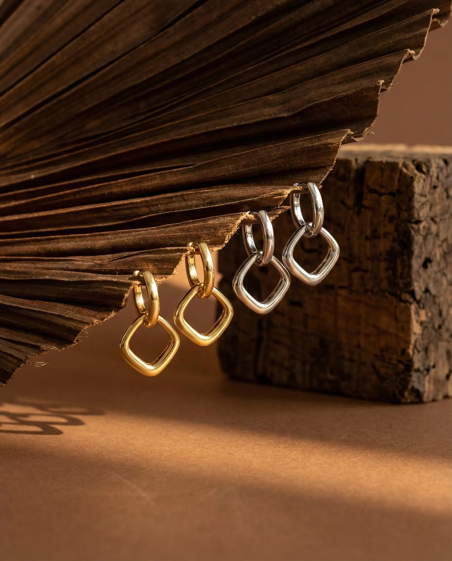 anti-tarnish-gold-rhombus-earrings-detail, geometric-earring-stacking-ideas, jewelry-for-sensitive-skin-925-silver, upscale-jewelry-brand-denmark, modern-classic-drop-earring-design