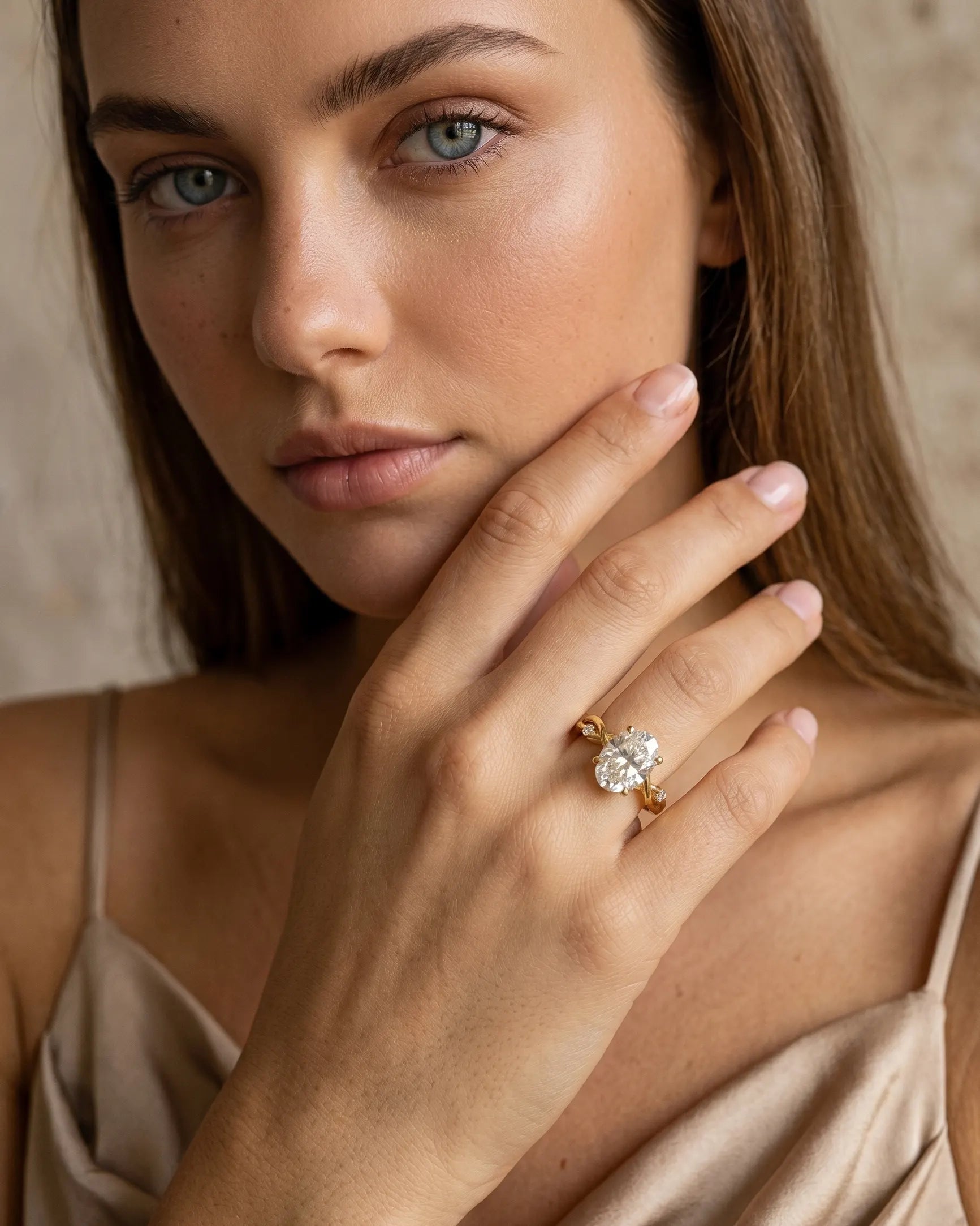 artistic-jewelry-display-magma-twisted-ring-silver-gold, creative-still-life-luxury-accessories, premium-fine-jewelry-showcase, modern-sculptural-ring-presentation