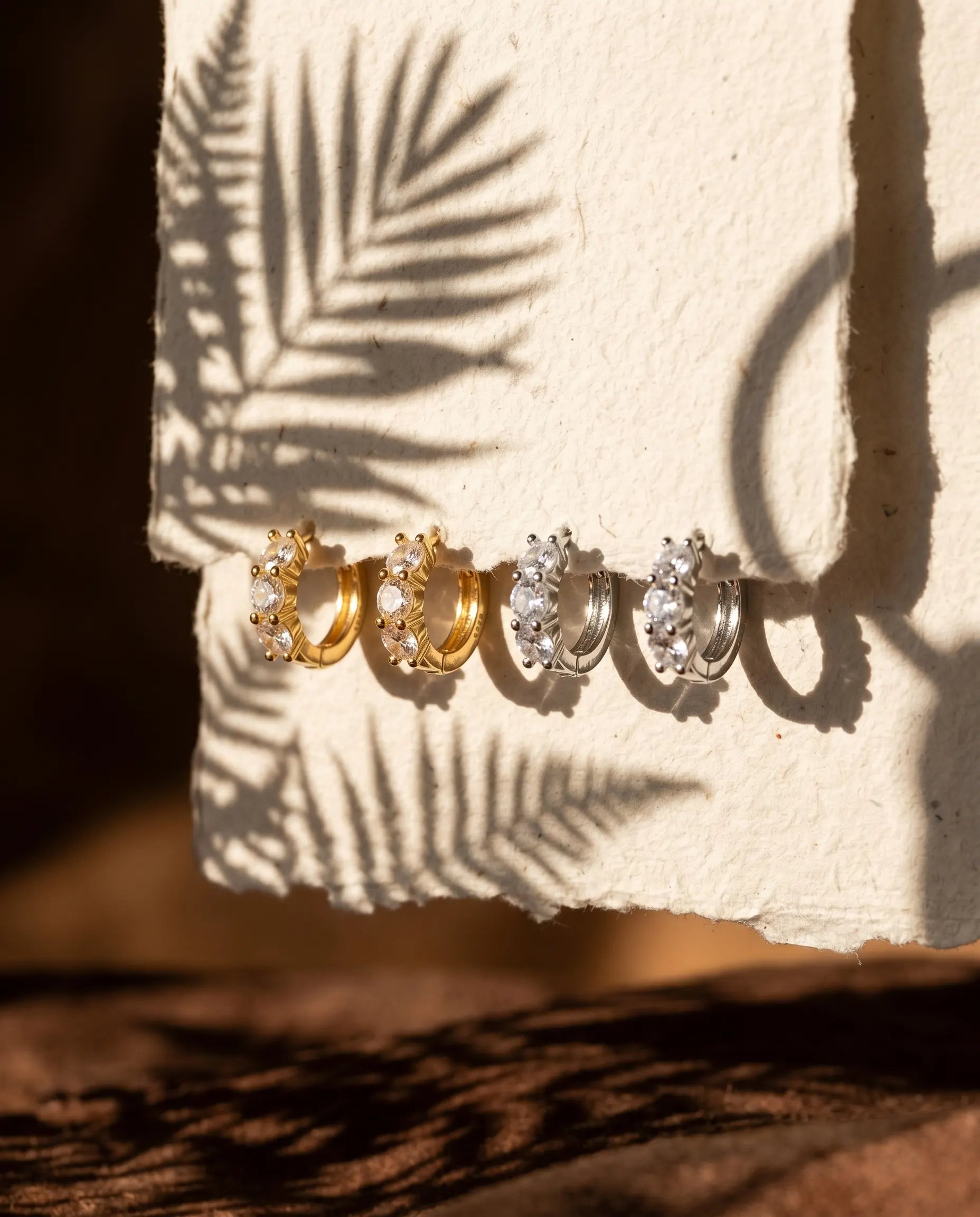 blanca-crystal-huggie-hoops-925-sterling-silver-18k-gold-plating, elegant-minimalist-everyday-jewelry-luxury, high-quality-hypoallergenic-tarnish-free-petite-hoops, senya-jewelry-best-seller-blanca