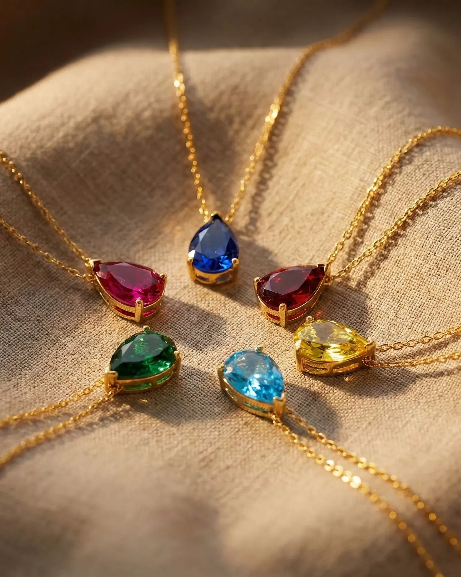 durable-waterproof-birthstone-necklaces-tarnish-free, pear-cut-zirconia-necklaces-texture, high-quality-gold-PVD-jewelry, anti-allergy-steel-necklaces-premium, refined-jewelry-collection-germany, sustainable-luxury-jewelry-styling