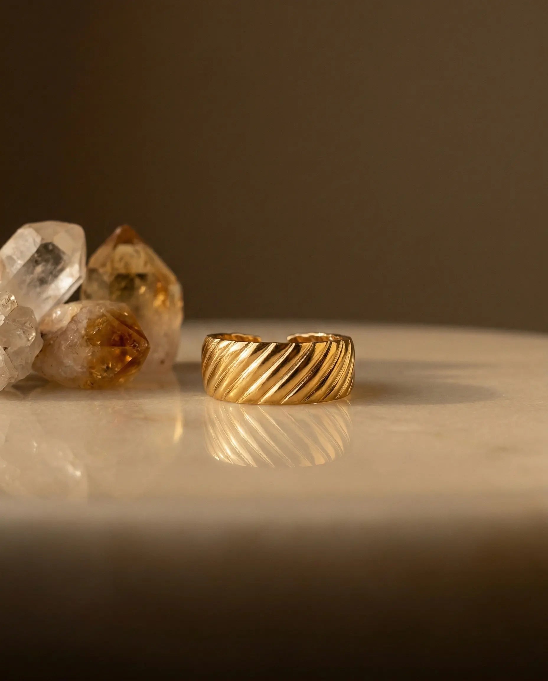 eva-adjustable-wide-band-ring-gold-pvd-steel, sculptural-gold-statement-ring-luxury, luxury-waterproof-jewelry-aesthetic, 316L-stainless-steel-ring-europe, senya-jewelry-best-seller-eva-ring