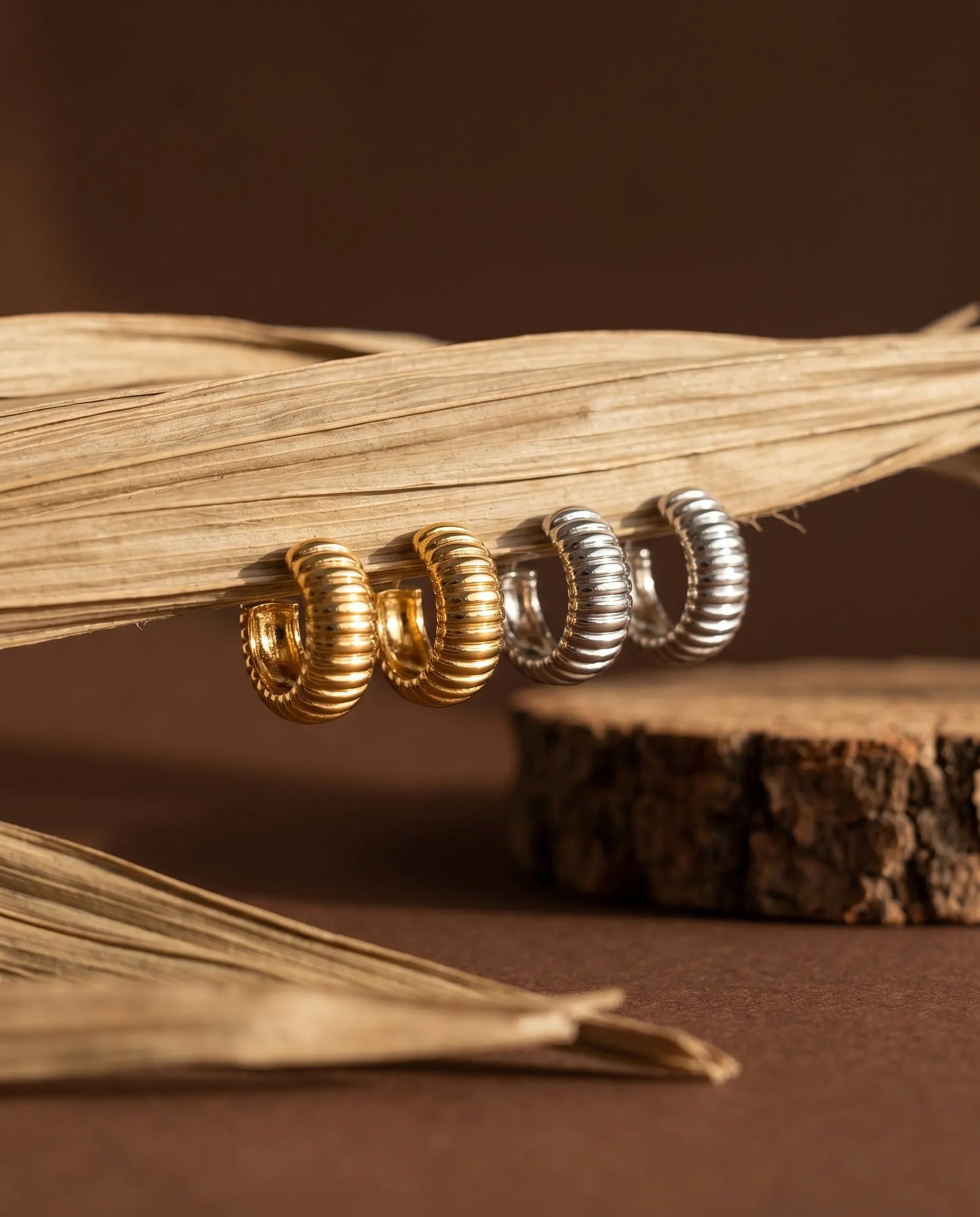 glam-ribbed-huggie-hoops-in-gold-and-silver-waterproof-stainless-steel-minimalist-architectural-jewelry-design-by-senya