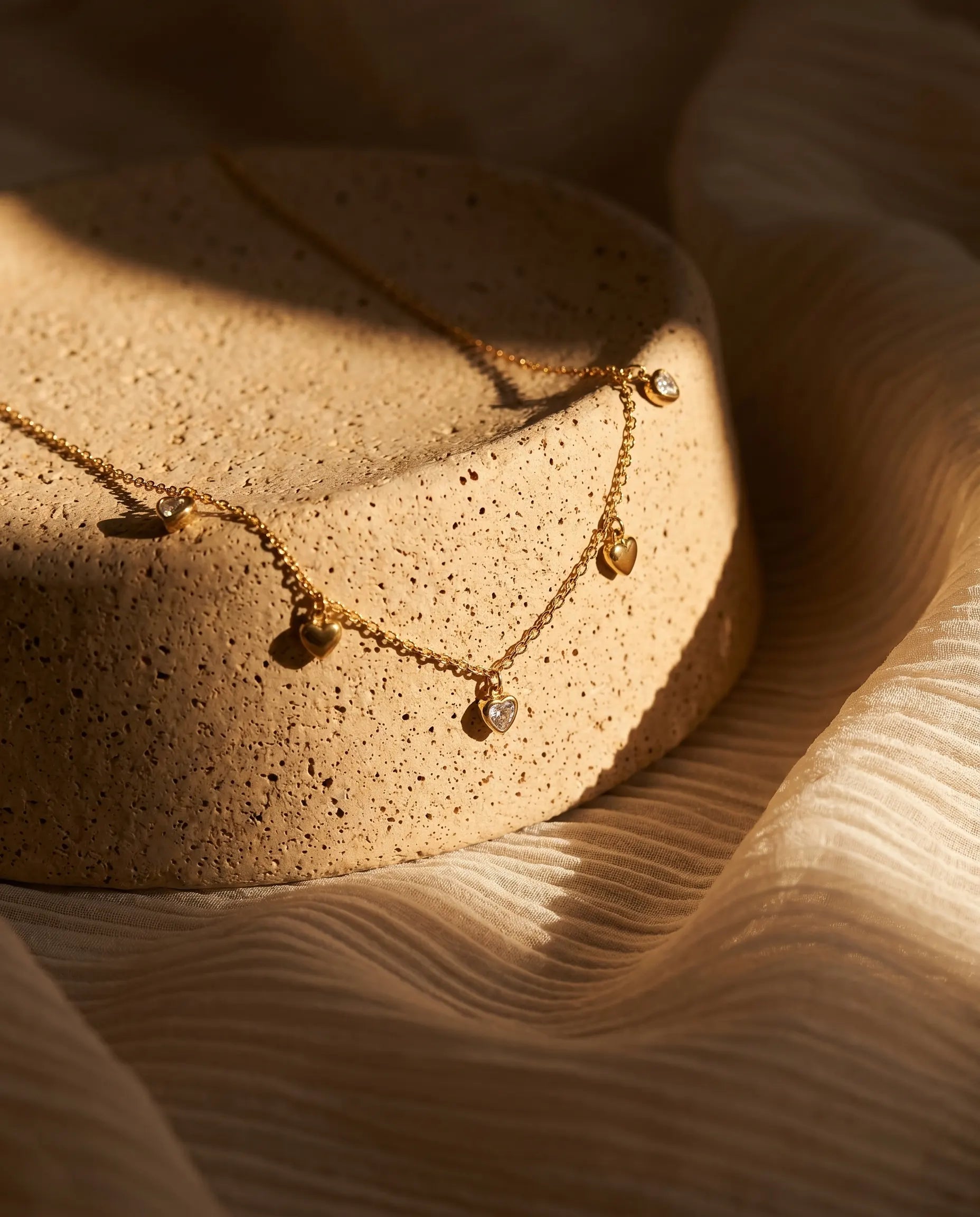isabella-station-necklace-elegant-five-heart-design-worn-as-everyday-luxury-jewelry-for-modern-women
