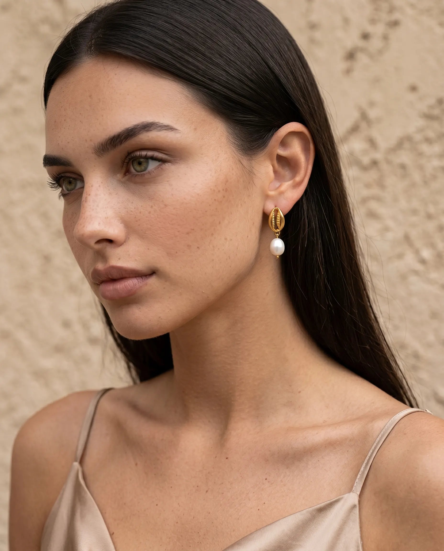 model-profile-wearing-ava-linear-stud-earrings-minimalist-styling-idea-for-modern-elegant-looks