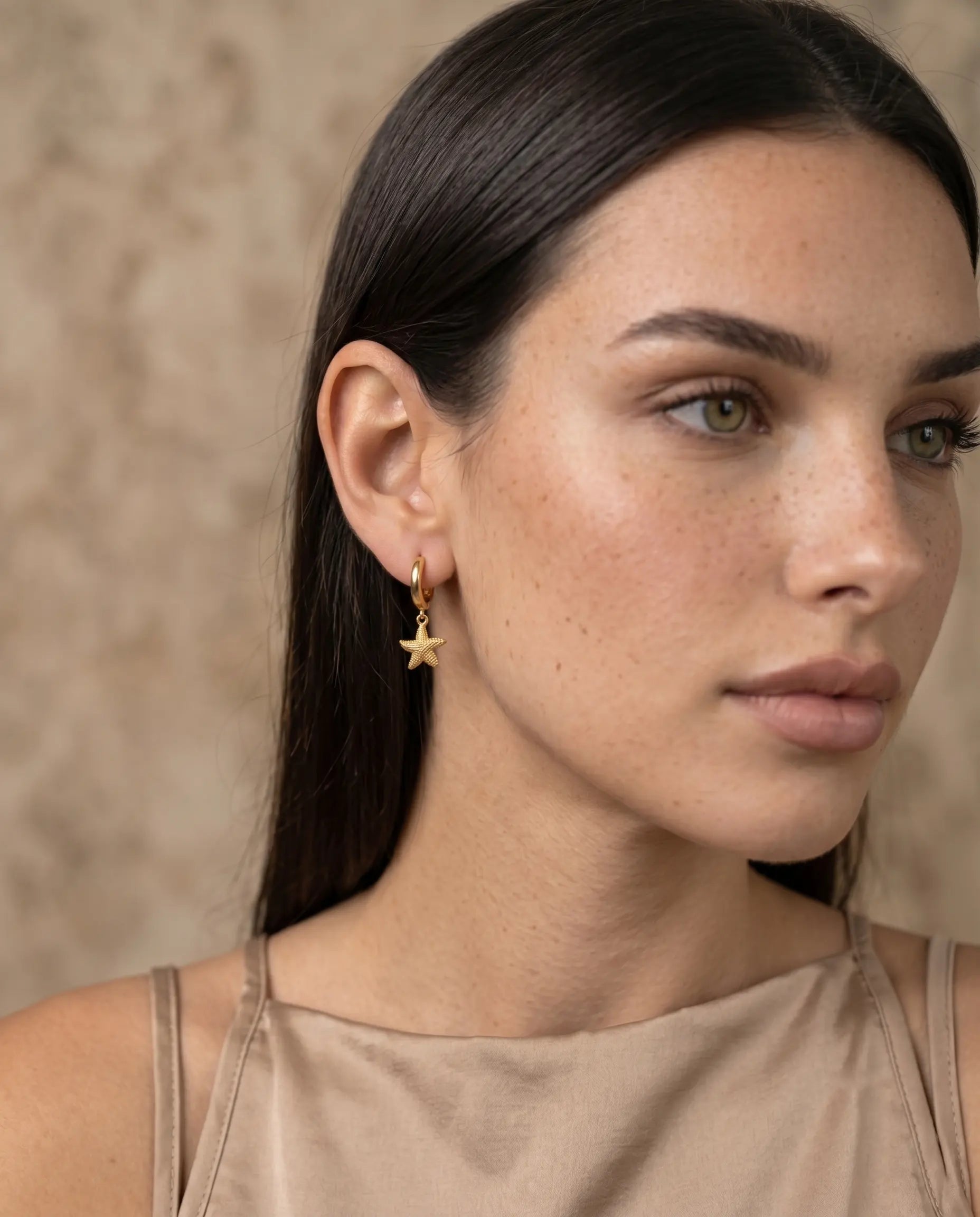 model-profile-wearing-nerella-starfish-hoops-minimalist-everyday-luxury-jewelry-style-for-modern-women