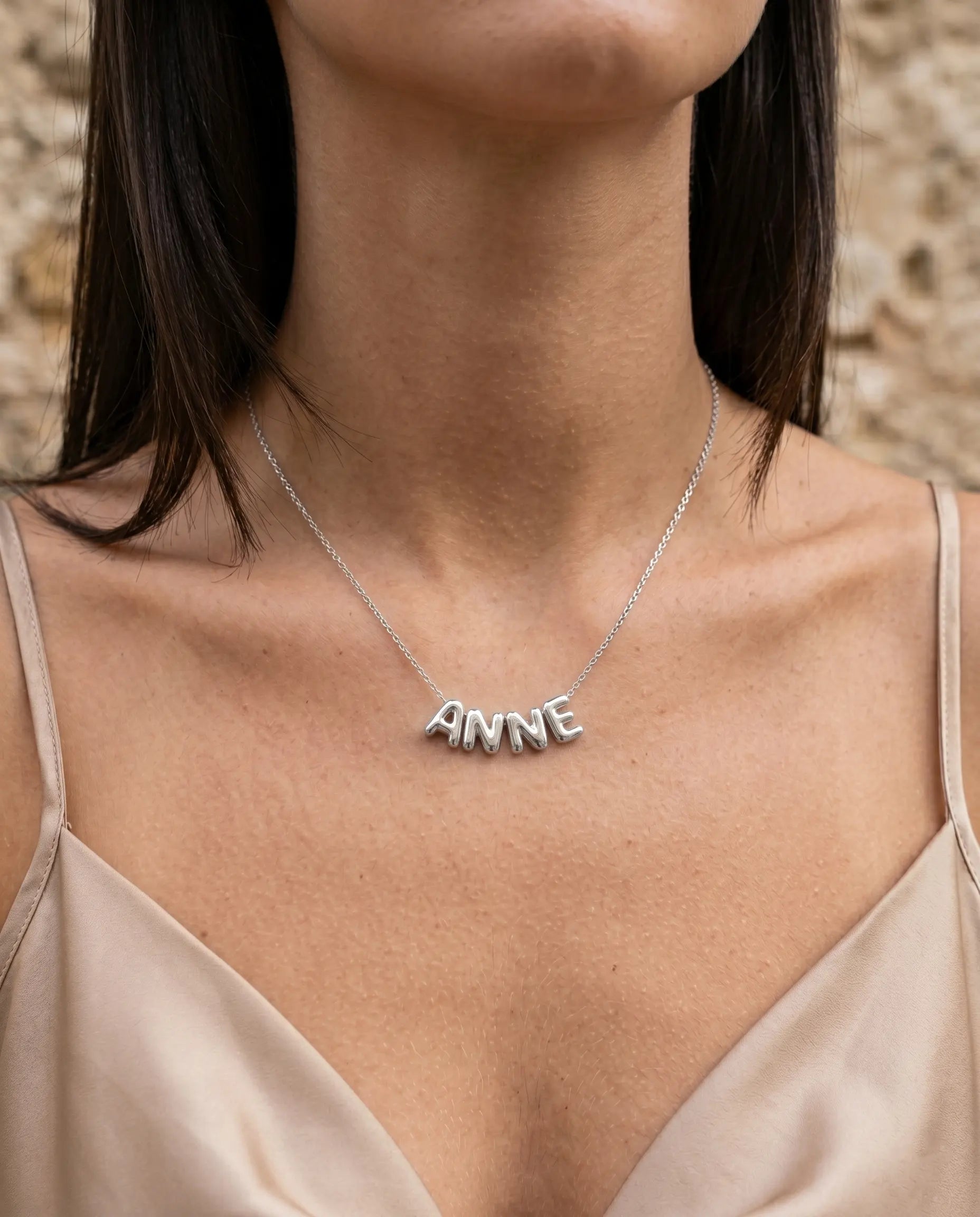 model-profile-wearing-poppy-custom-name-necklace-minimalist-everyday-luxury-jewelry-style