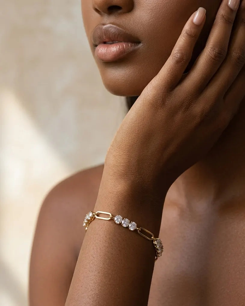 model-wearing-gold-aroma-crystal-bracelet-lifestyle, elegant-modern-feminine-jewelry-on-wrist, professional-women-luxury-accessories, chic-gold-paperclip-bracelet-styling, luxury-lifestyle-brand-model