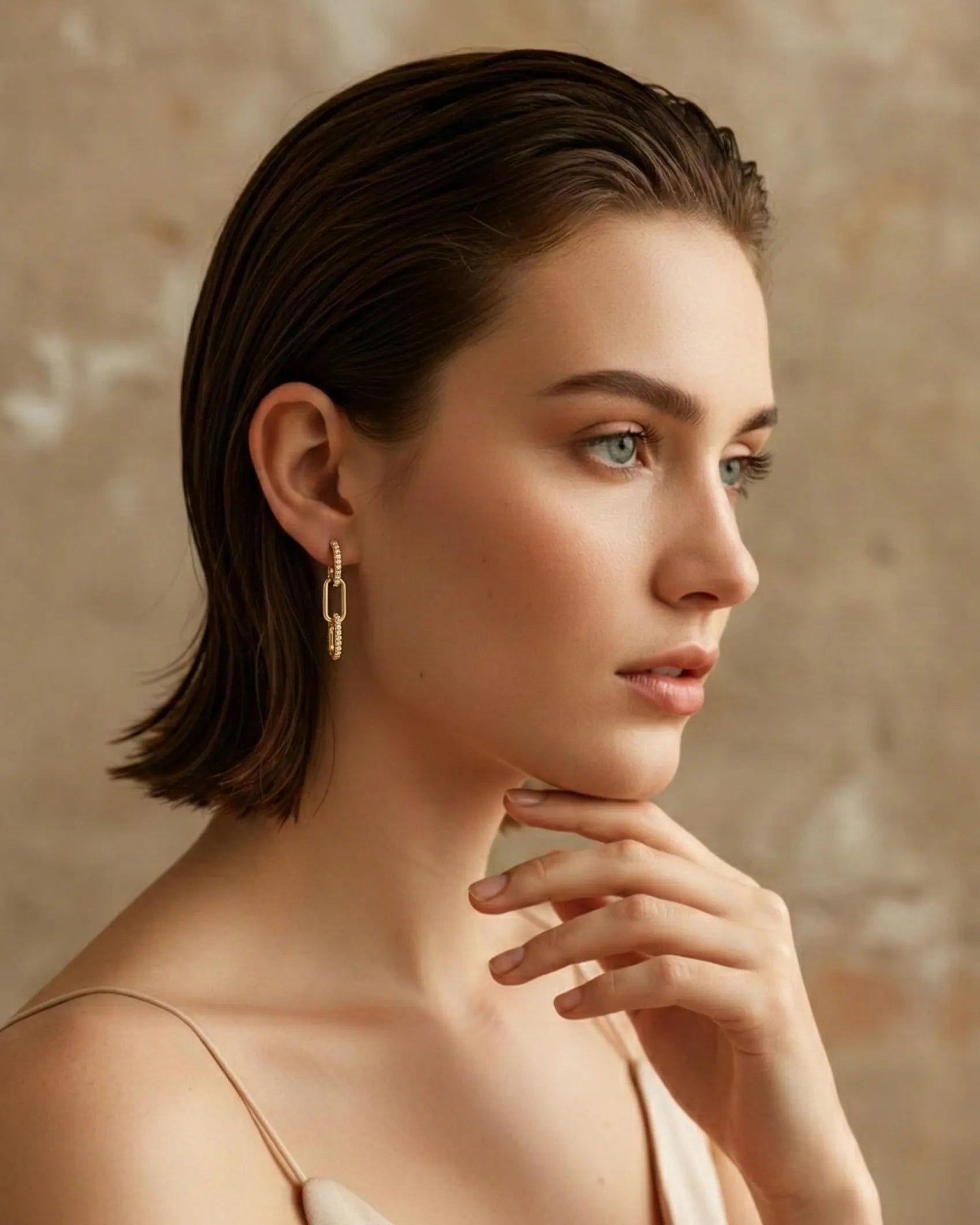 model-wearing-gold-brooklyn-paperclip-earrings, elegant-elevated-trend-jewelry-lifestyle, professional-women-luxury-accessories, chic-architectural-drop-earrings-photography, luxury-lifestyle-brand-model
