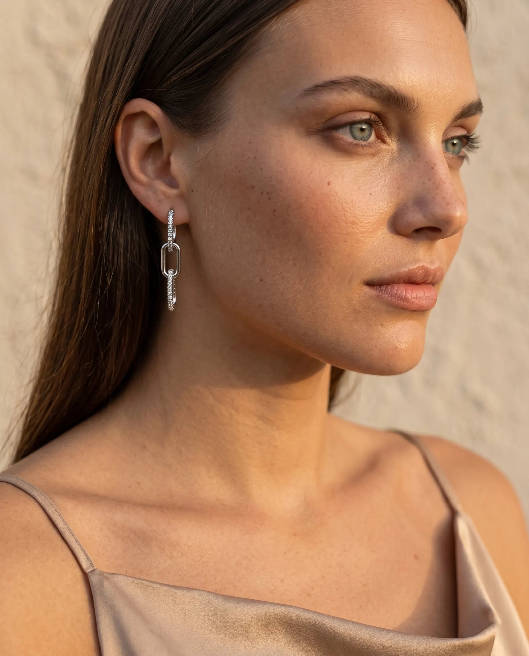 model-wearing-gold-brooklyn-paperclip-earrings, elegant-elevated-trend-jewelry-lifestyle, professional-women-luxury-accessories, chic-architectural-drop-earrings-photography, luxury-lifestyle-brand-model