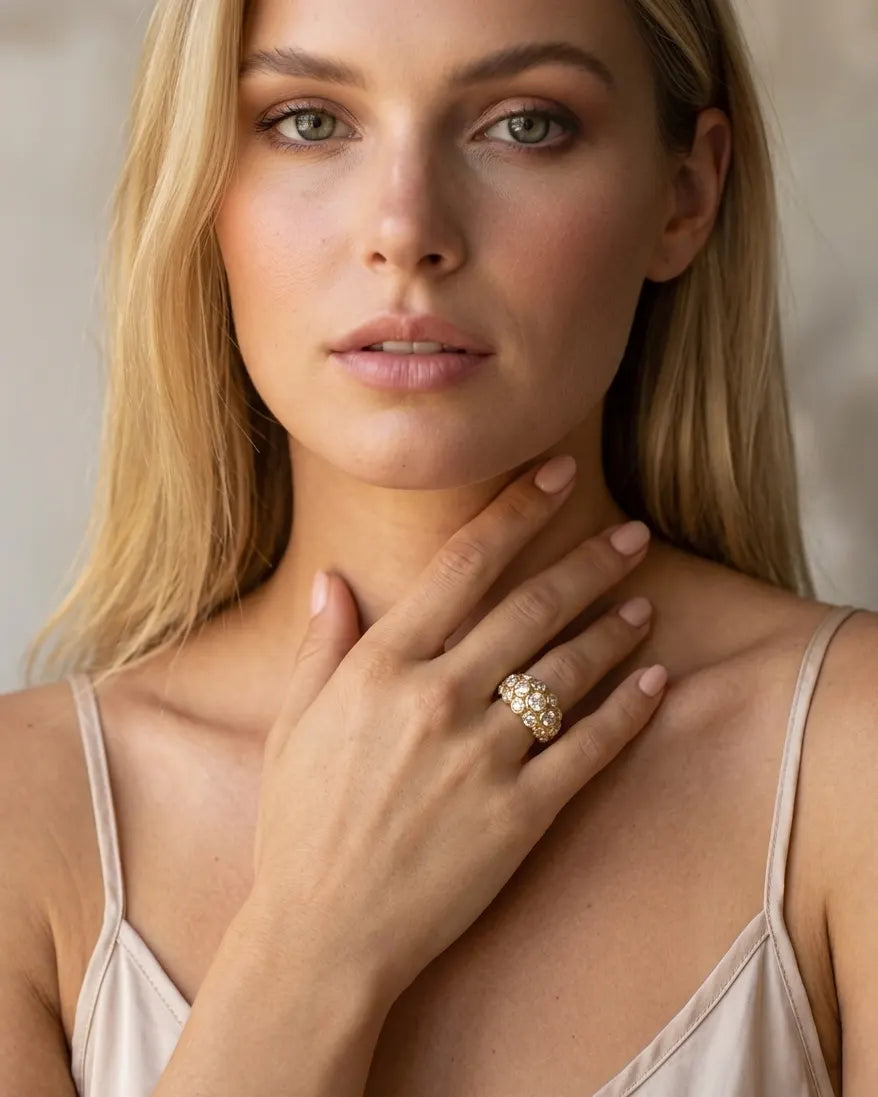 model-wearing-gold-calytrix-oval-halo-ring-lifestyle, elegant-modern-celestial-jewelry-on-hand, professional-women-luxury-accessories, chic-gold-solitaire-styling, luxury-lifestyle-brand-model