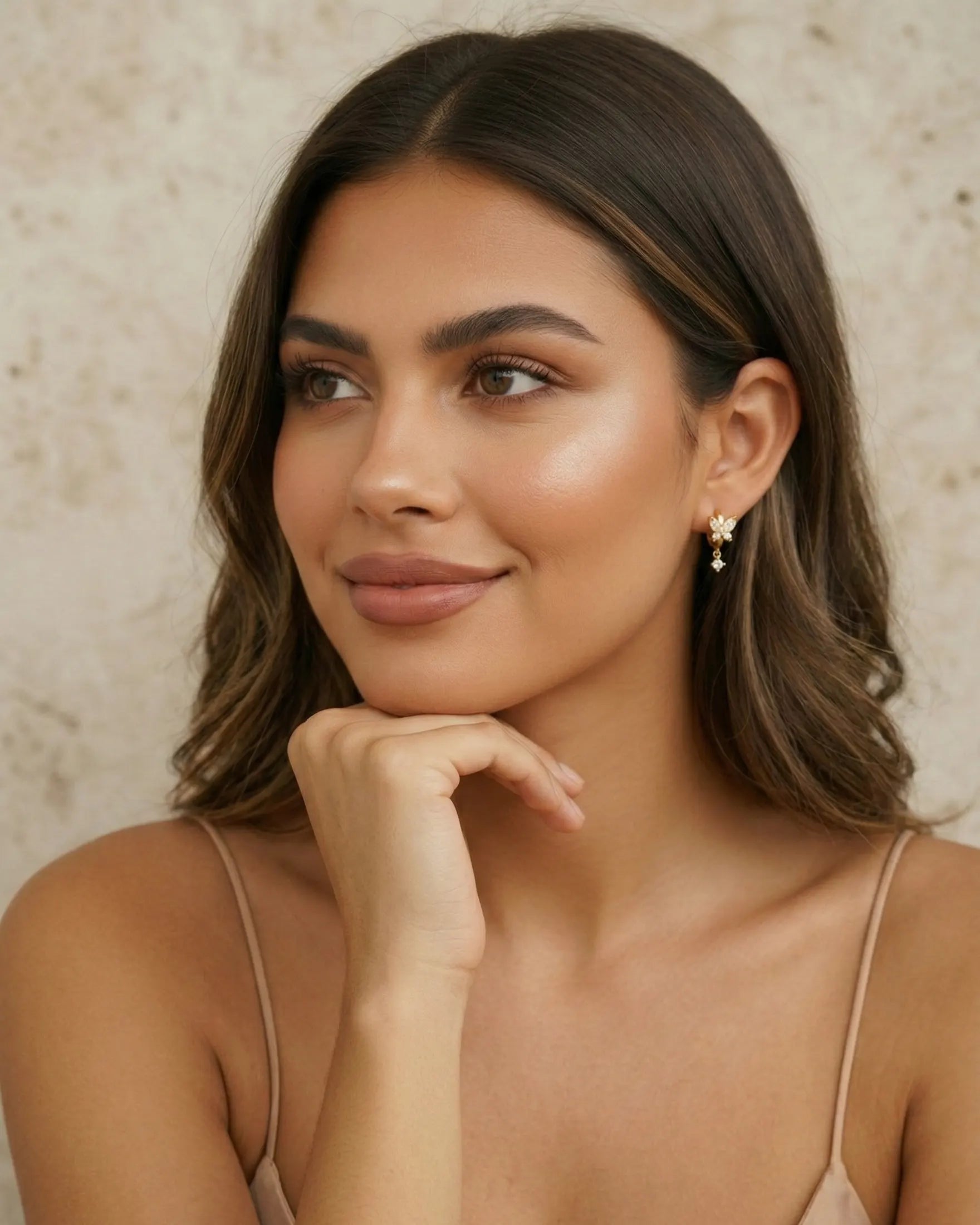 model-wearing-gold-chiara-butterfly-earrings, elegant-feminine-jewelry-lifestyle, professional-women-jewelry-style, chic-minimalist-butterfly-accessories-photography, luxury-lifestyle-brand-model