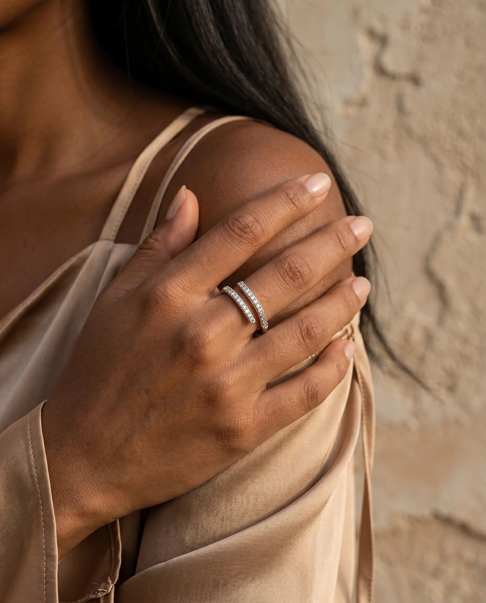 model-wearing-gold-cleo-adjustable-wrap-ring-lifestyle, elegant-modern-feminine-jewelry-on-hand, professional-women-luxury-accessories, chic-double-band-gold-styling, luxury-lifestyle-brand-model