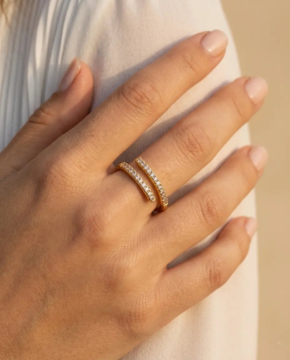 model-wearing-gold-cleo-adjustable-wrap-ring-lifestyle, elegant-modern-feminine-jewelry-on-hand, professional-women-luxury-accessories, chic-double-band-gold-styling, luxury-lifestyle-brand-model