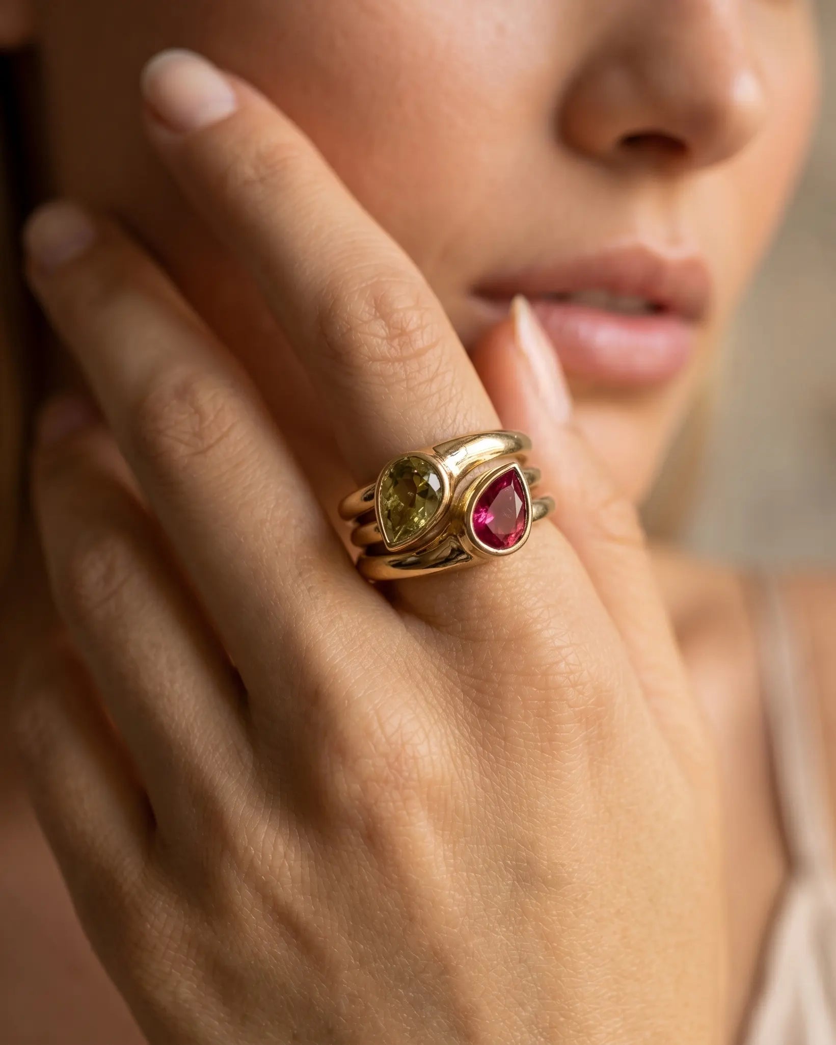 model-wearing-gold-katrina-dual-stone-ring-lifestyle, elegant-bold-feminine-jewelry-on-hand, professional-women-luxury-accessories, chic-gemstone-gold-styling, luxury-lifestyle-brand-model