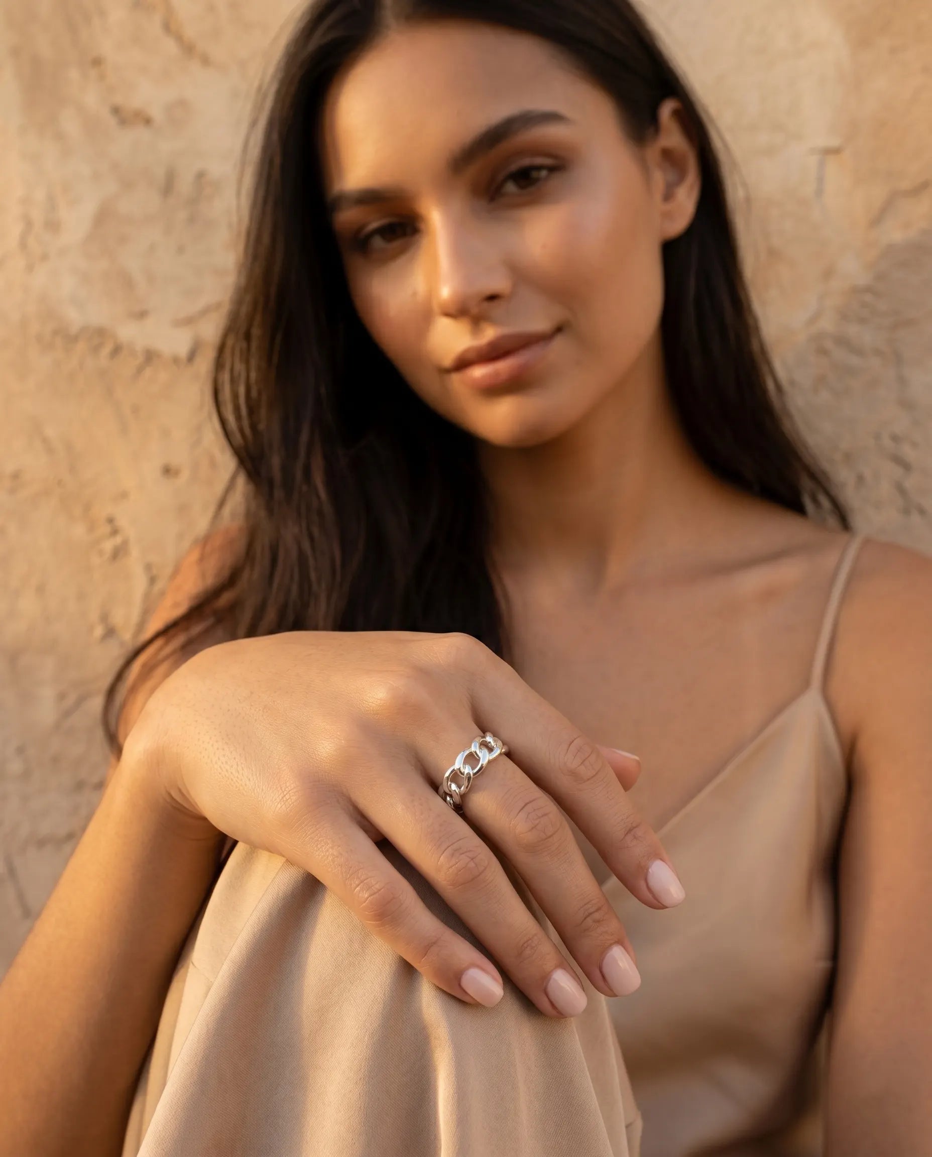 model-wearing-gold-kiana-chain-ring-lifestyle, elegant-modern-understated-jewelry-on-hand, professional-women-luxury-accessories, chic-925-silver-chain-ring-styling, luxury-lifestyle-brand-model