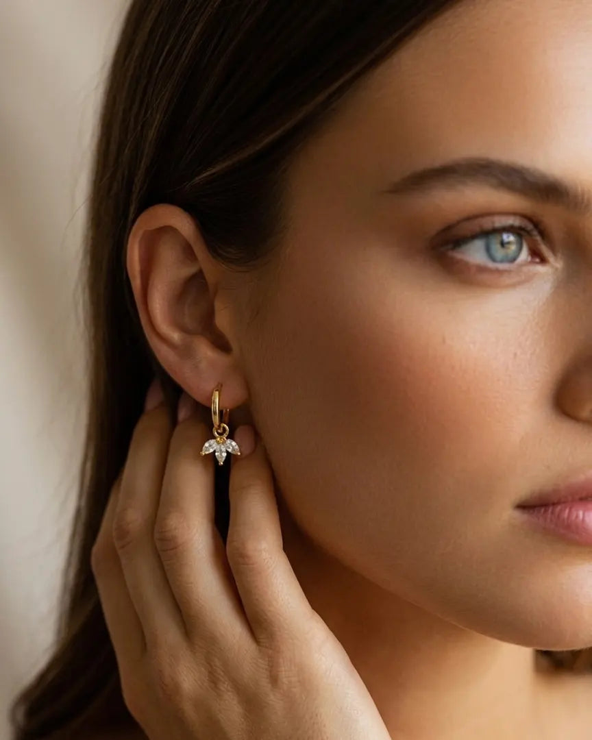 model-wearing-gold-sweet-marquise-lotus-huggies-lifestyle, elegant-modern-feminine-jewelry-on-ear, professional-women-luxury-accessories, chic-floral-gold-styling, luxury-lifestyle-brand-model
