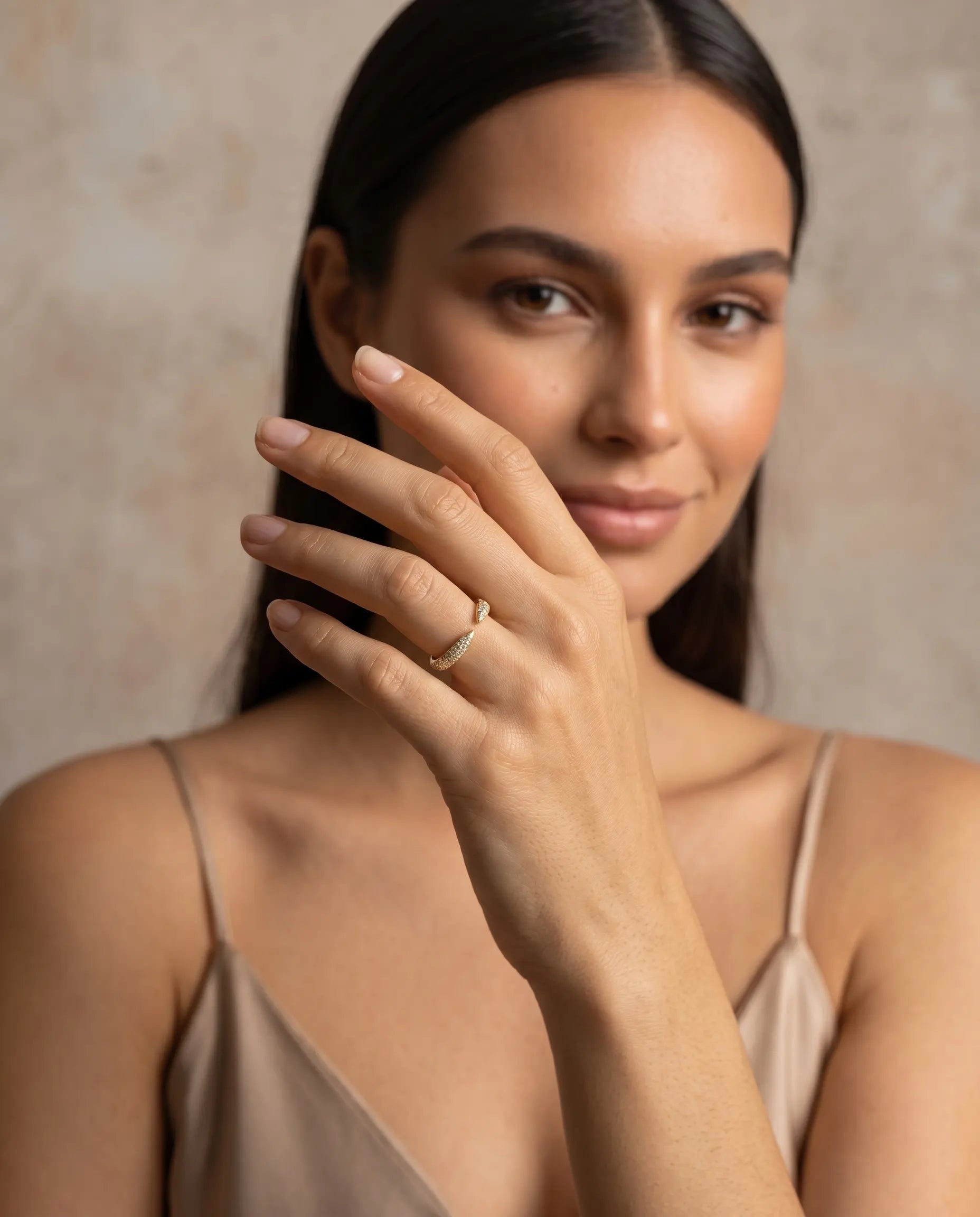 model-wearing-gold-tear-adjustable-wrap-ring-lifestyle, elegant-modern-feminine-jewelry-on-hand, professional-women-luxury-accessories, chic-pave-gold-styling, luxury-lifestyle-brand-model