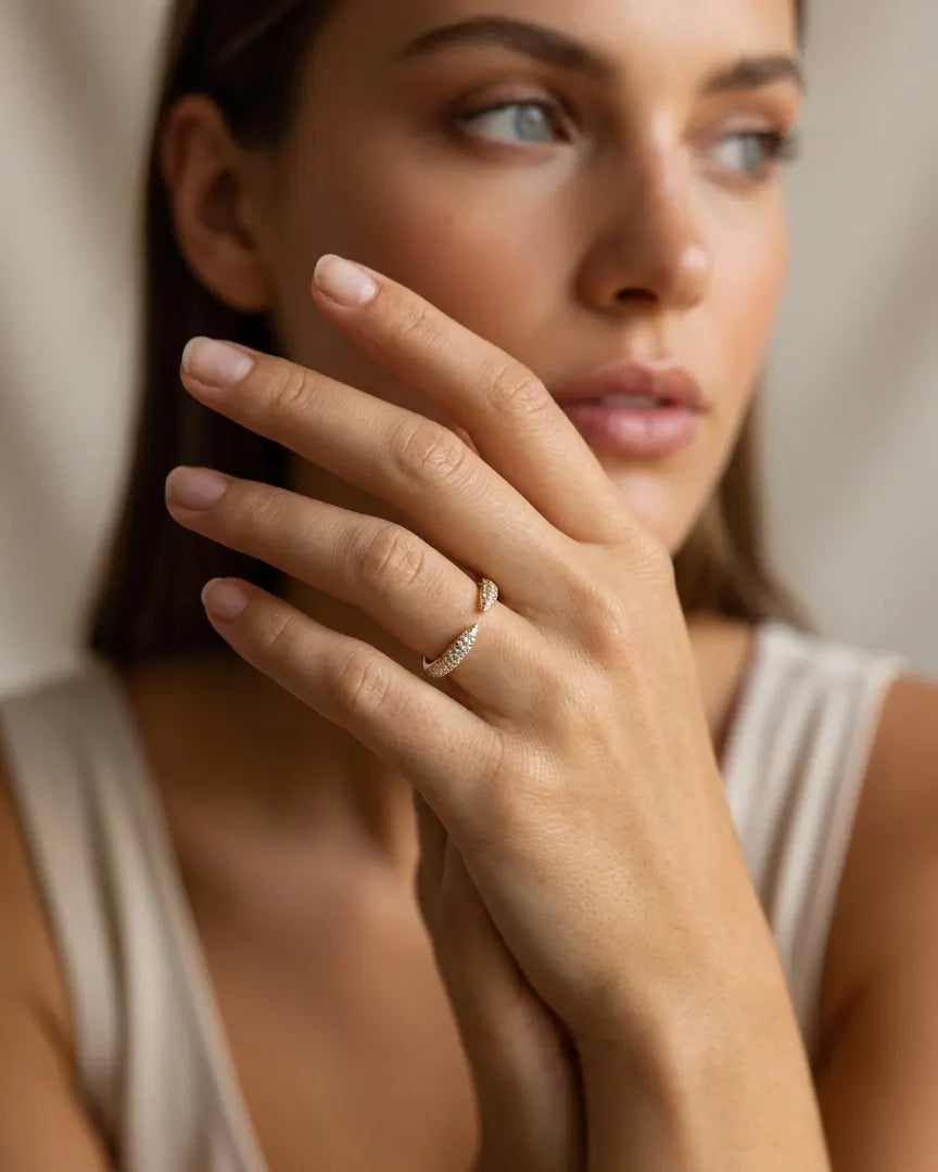 model-wearing-gold-tear-adjustable-wrap-ring-lifestyle, elegant-modern-feminine-jewelry-on-hand, professional-women-luxury-accessories, chic-pave-gold-styling, luxury-lifestyle-brand-model