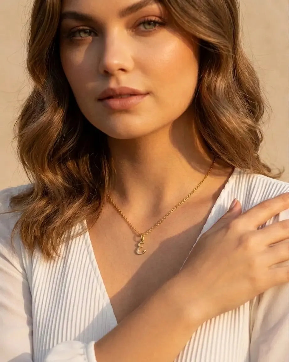model-wearing-gold-zahara-initial-necklace, elegant-personalized-signature-jewelry-lifestyle, professional-women-luxury-accessories, chic-minimalist-monogram-necklace-photography, luxury-lifestyle-brand-model