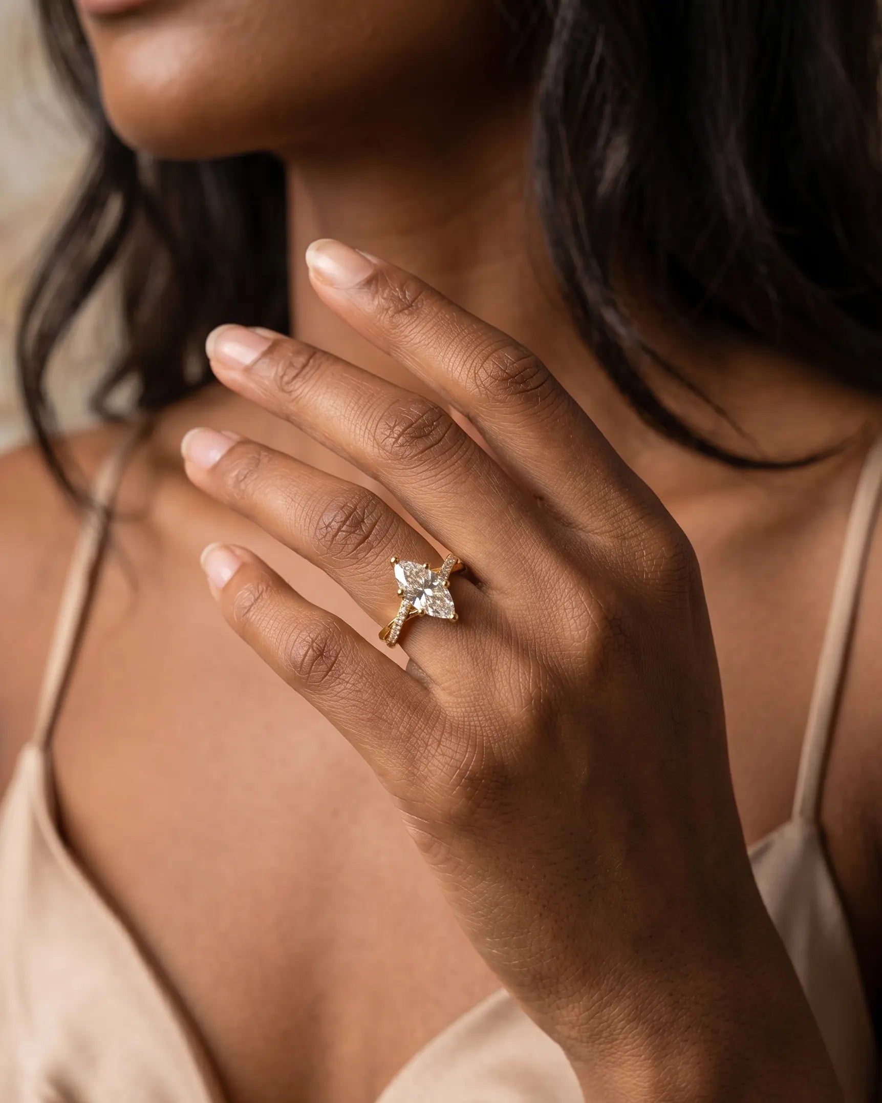 model-wearing-medea-marquise-silver-ring-lifestyle, elegant-modern-romantic-jewelry-on-hand, professional-women-luxury-accessories, chic-nature-inspired-ring-styling, luxury-lifestyle-brand-model