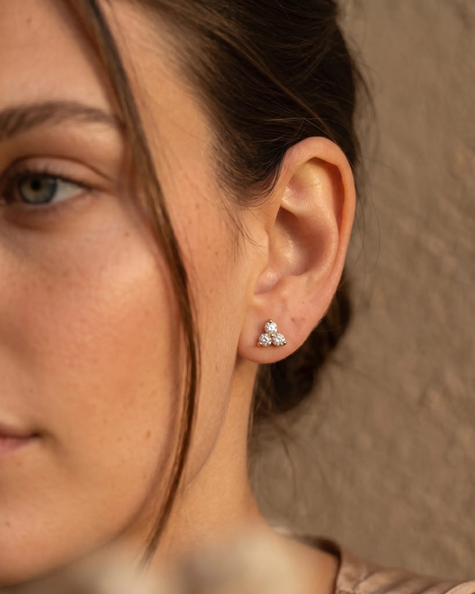 model-wearing-silver-blossom-crystal-cluster-studs-lifestyle, elegant-minimalist-everyday-jewelry-luxury, high-quality-hypoallergenic-tarnish-free-petite-earrings, senya-jewelry-best-seller-blossom