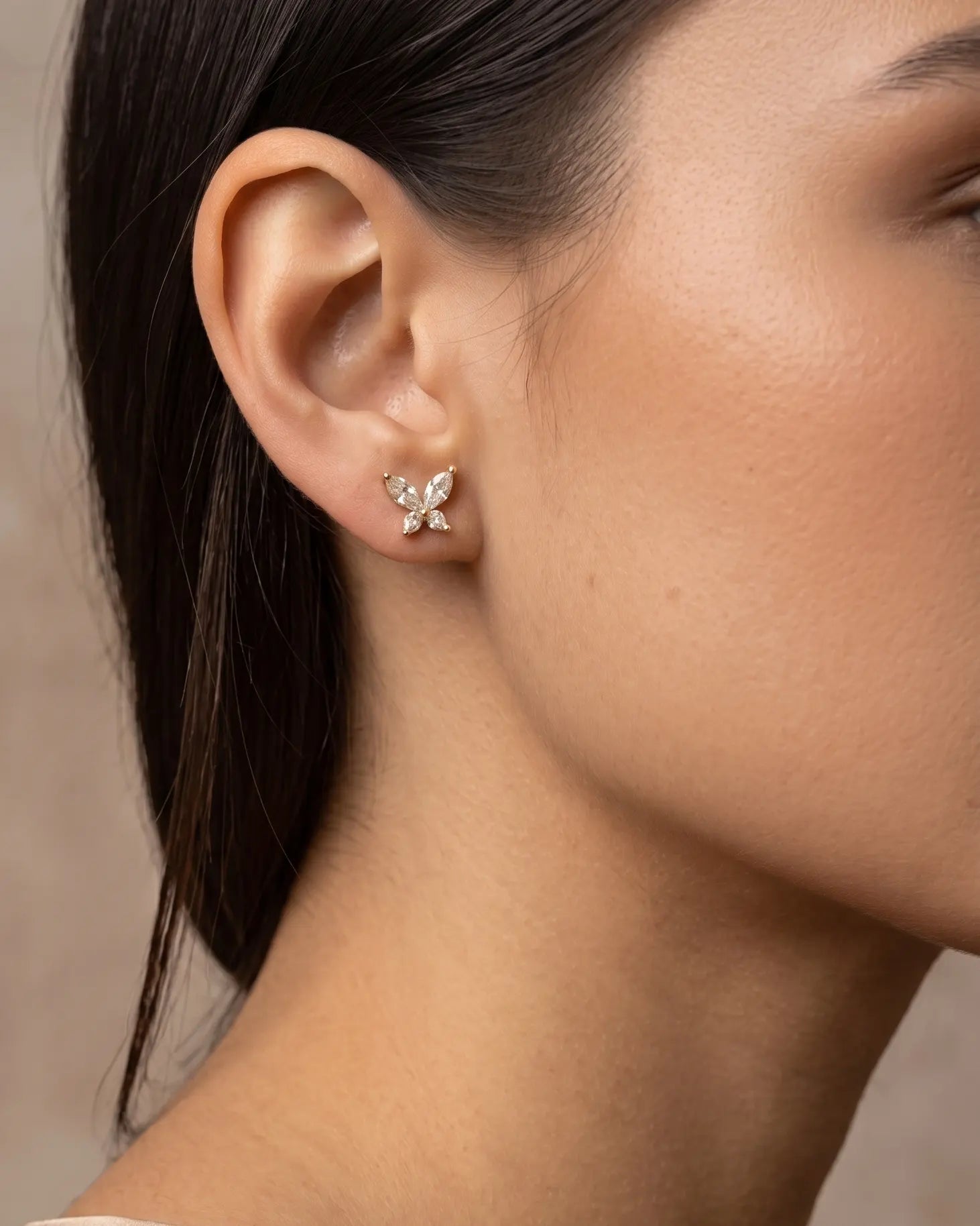 model-wearing-silver-butterfly-stud-earrings-lifestyle, elegant-modern-feminine-jewelry-on-ear, professional-women-luxury-accessories, chic-crystal-animal-studs-styling, luxury-lifestyle-brand-model